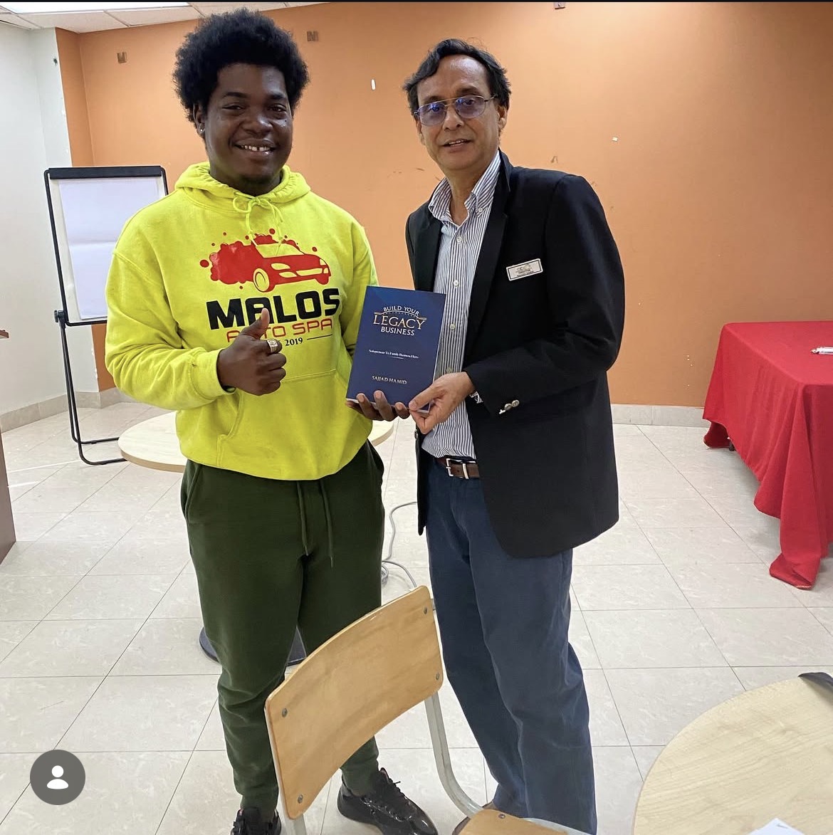 Marlon Skerritt receiving Build Your Legacy Business award