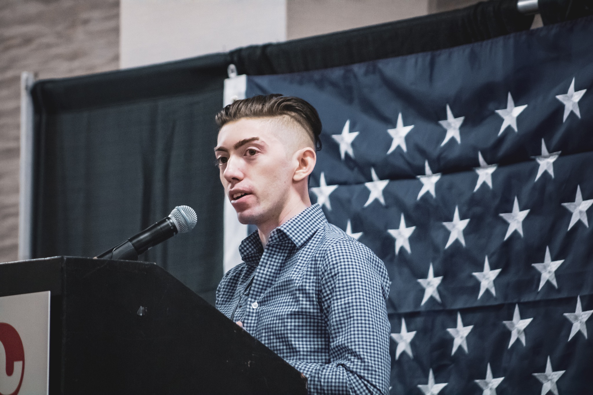 Brandon Neider speaking at community event