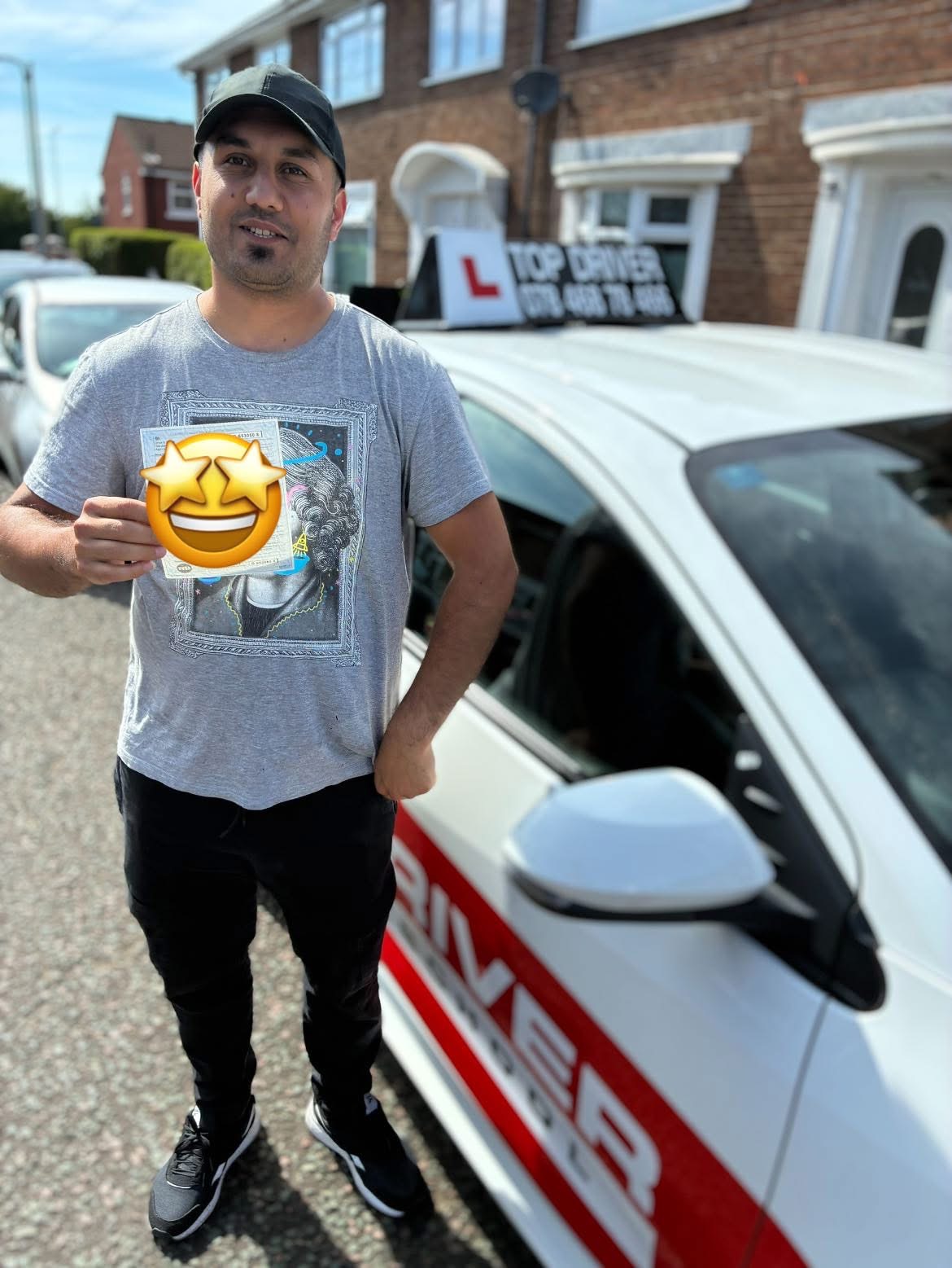 Happy male student celebrating test success