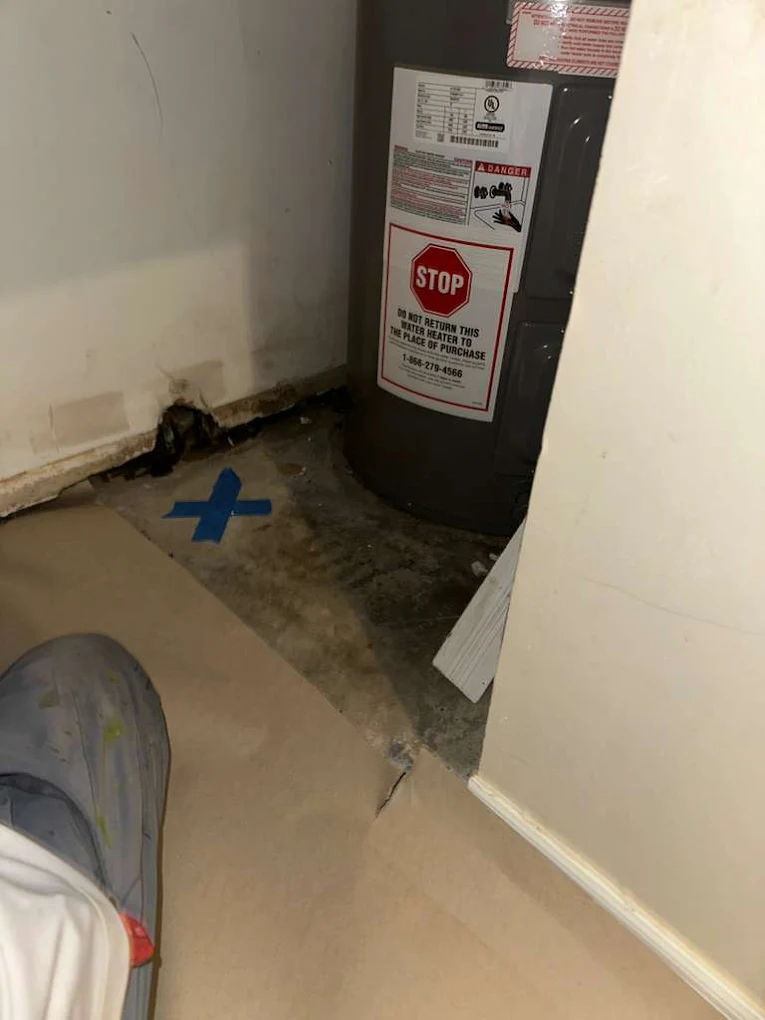 Water heater leak detection with marked leak location
