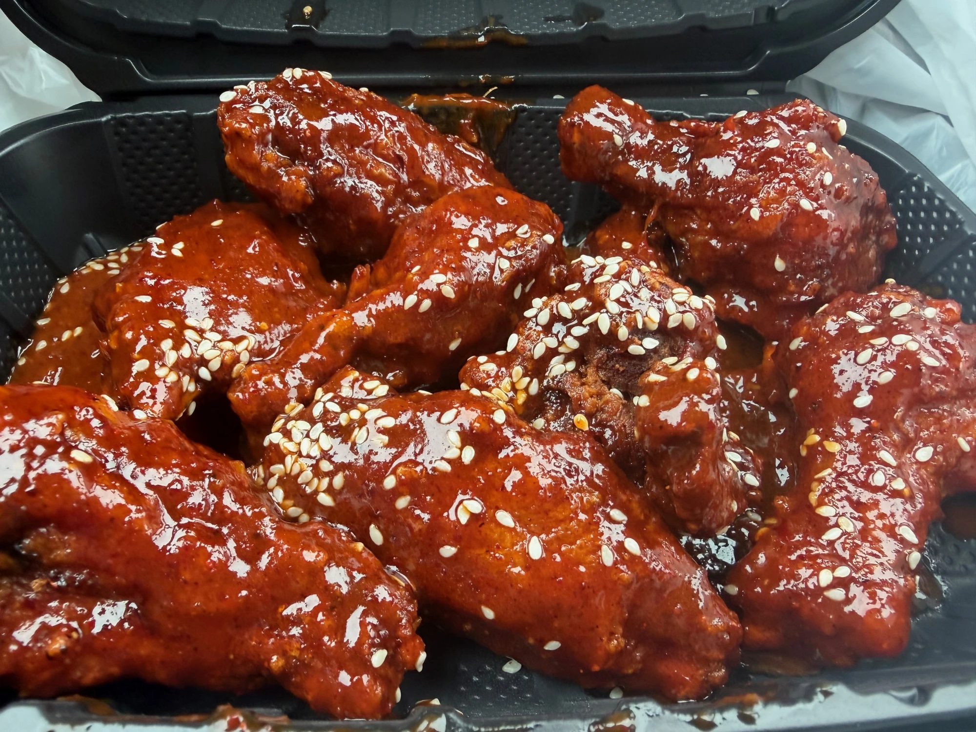 Saucy glazed 67 wings with sesame