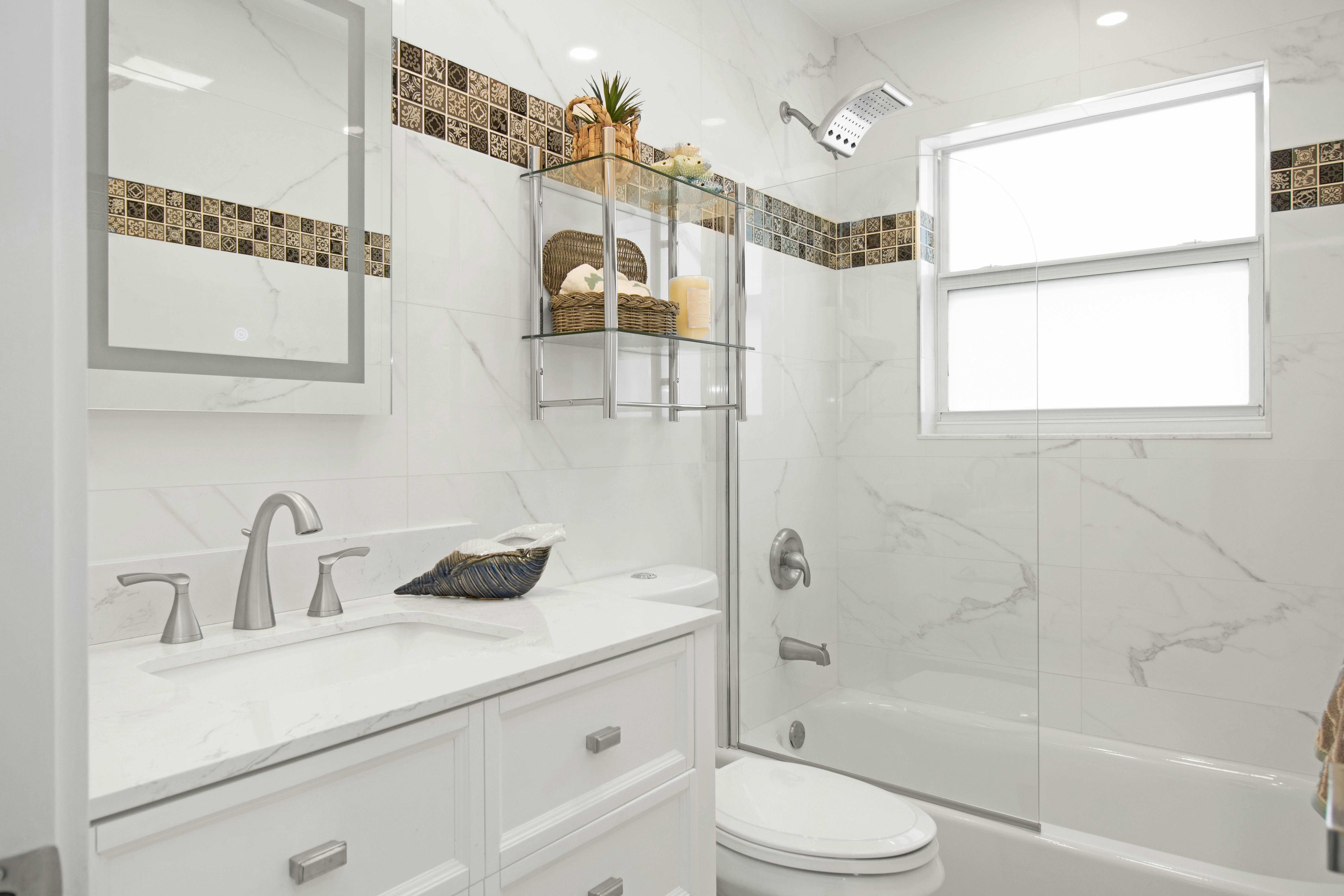 Elegant bathroom with decorative tile accents