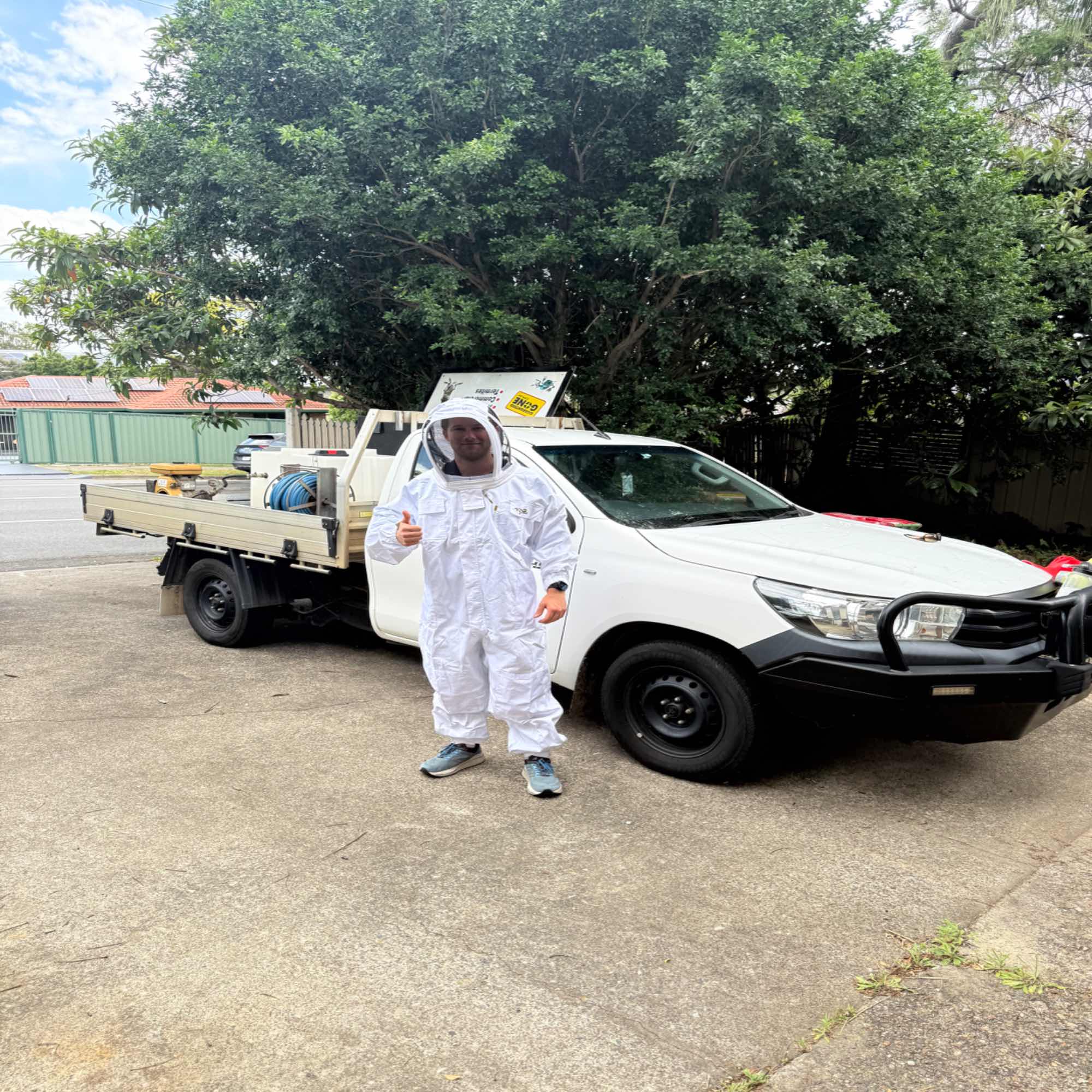 Pest Free Ipswich & Brisbane team with work vehicle