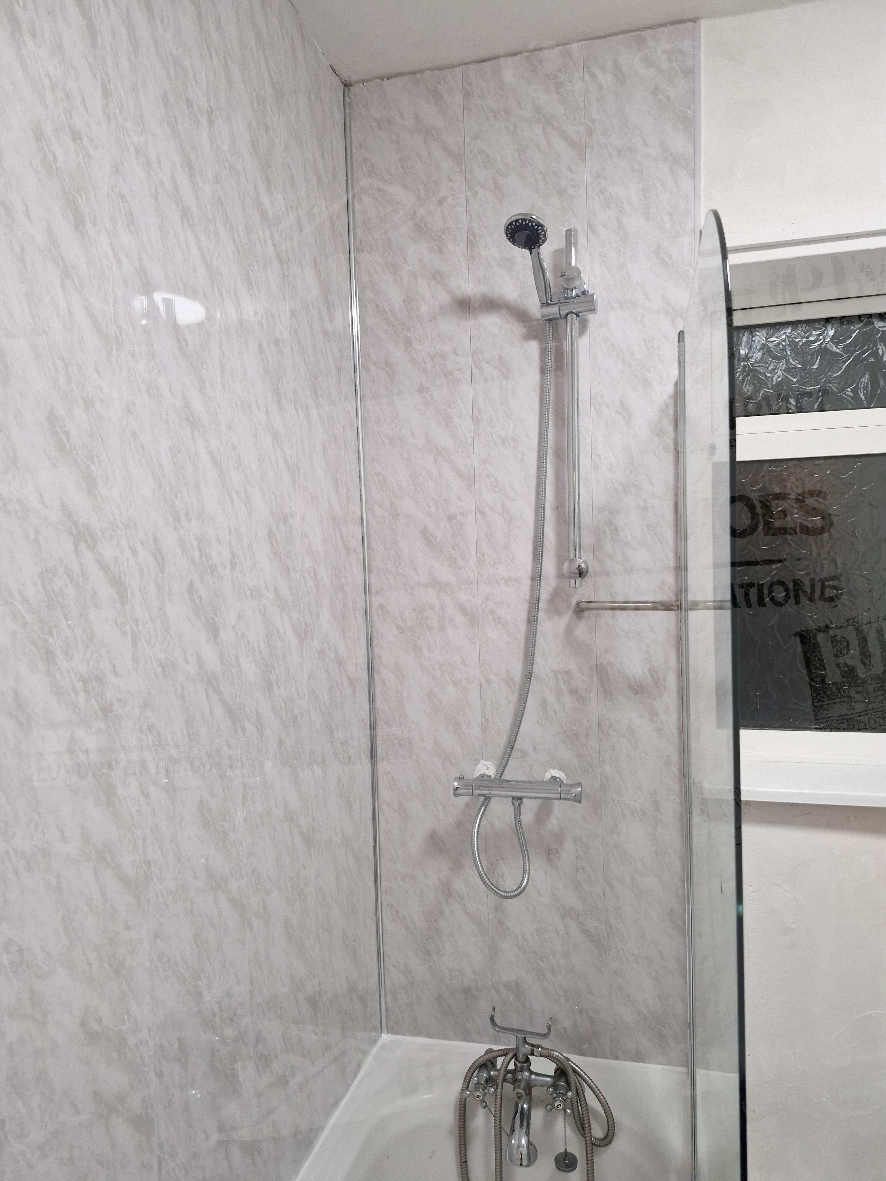 Installation of PVC Shower Panels and Shower Mixer Upgrade