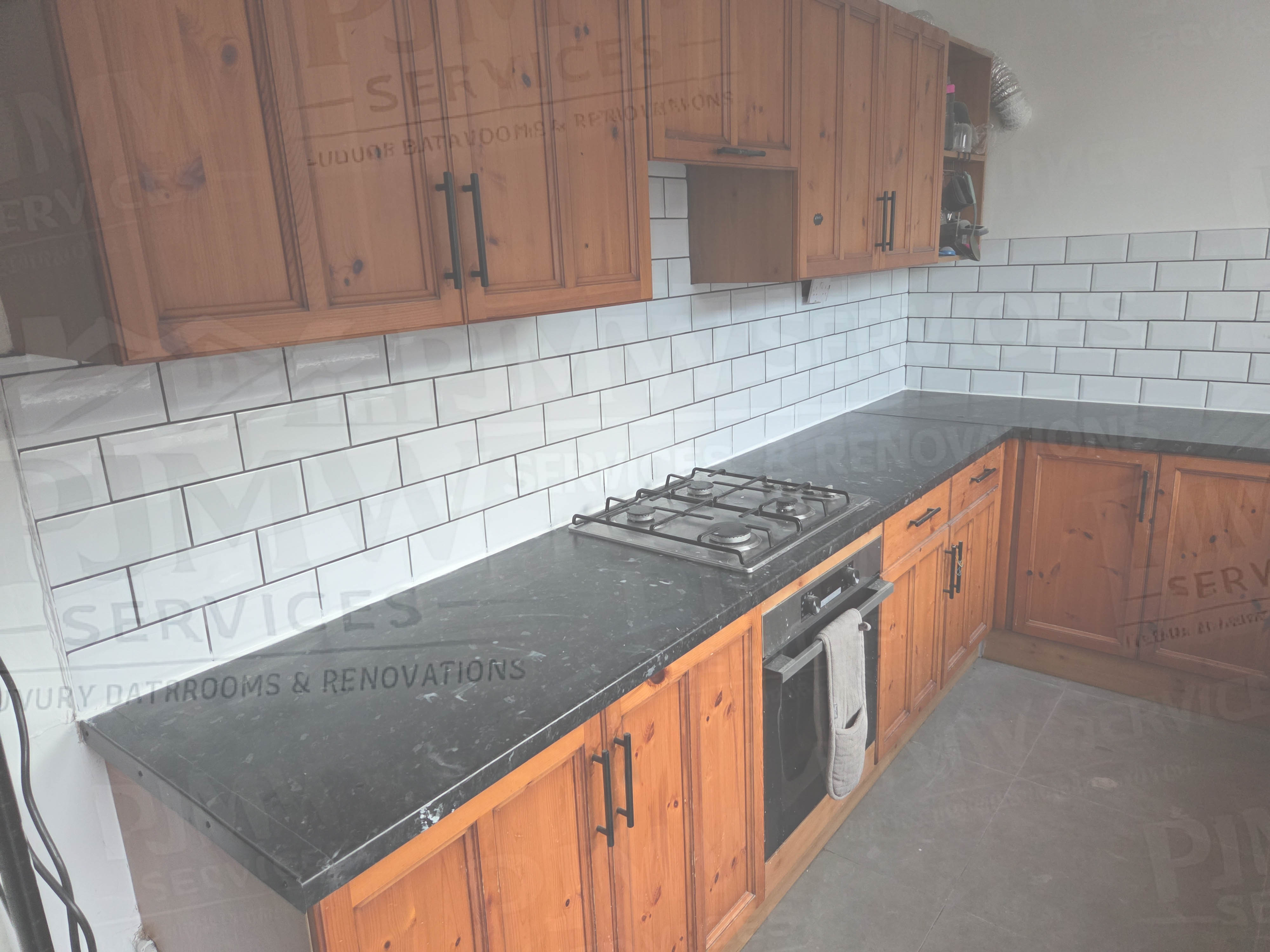 Kitchen Refurbishment, New Splash Back Tiles and Wall Repaired