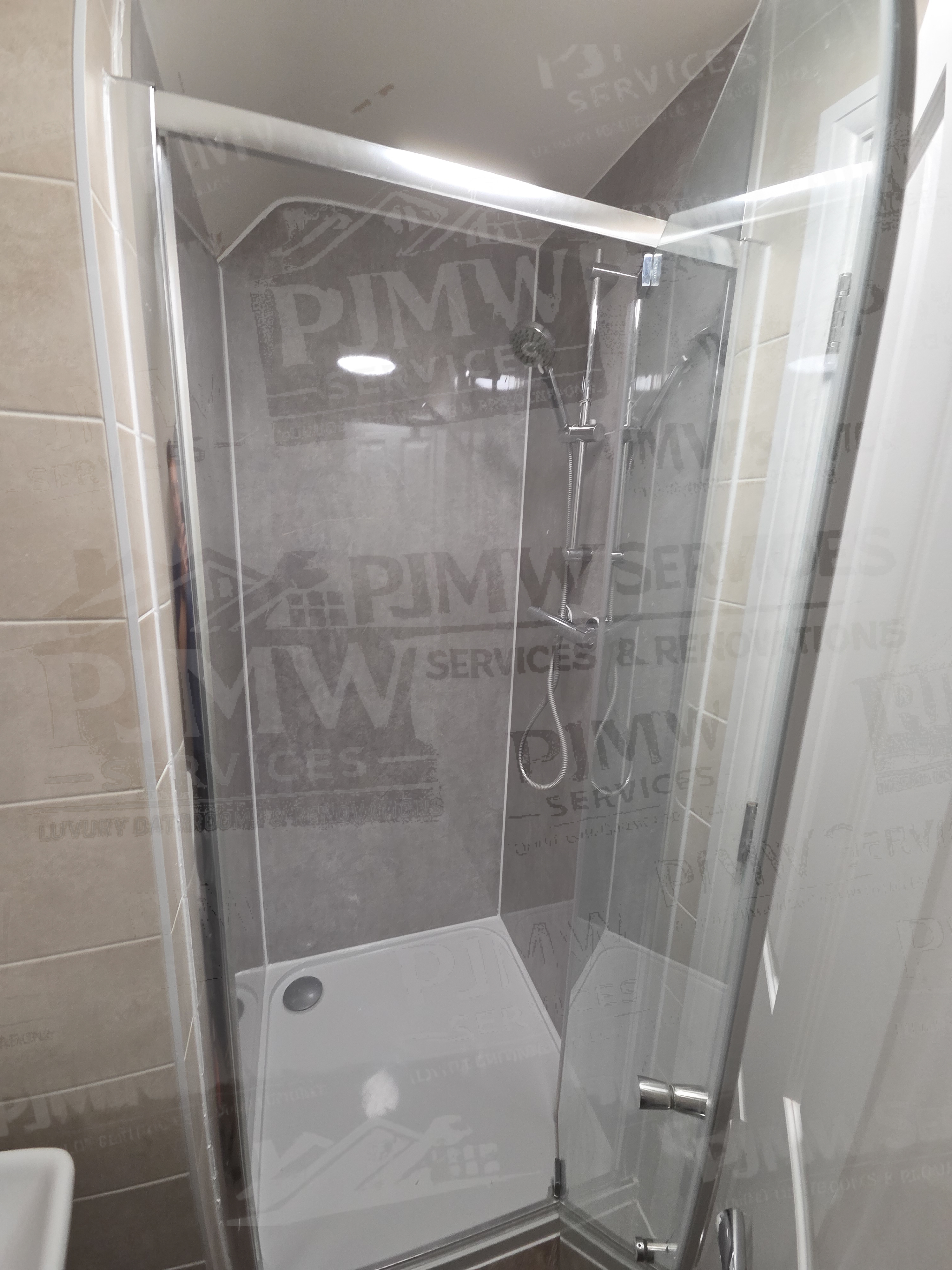 En Suite Bathroom Leak Repair and Panel Installation