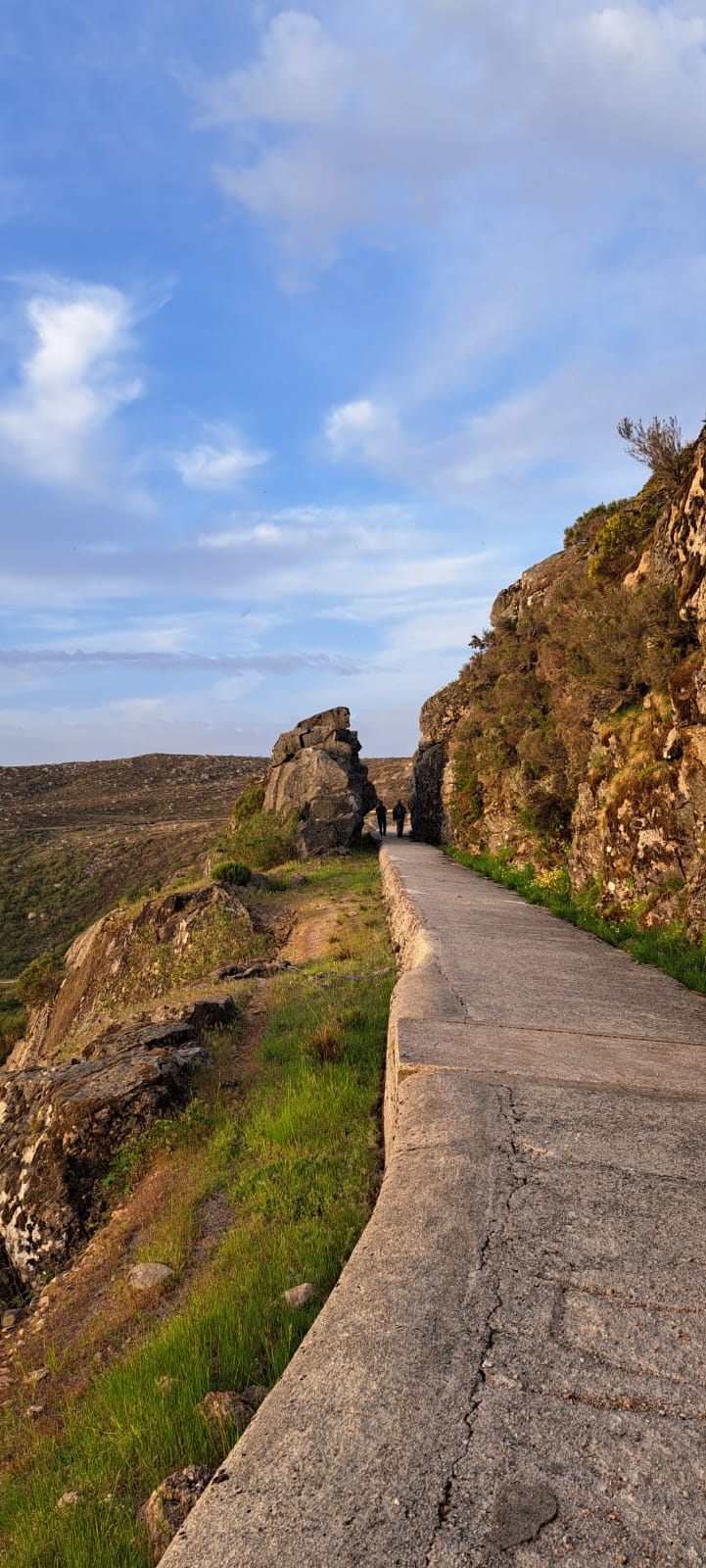 Mountain path between granite cliffs in Serra da Estrela