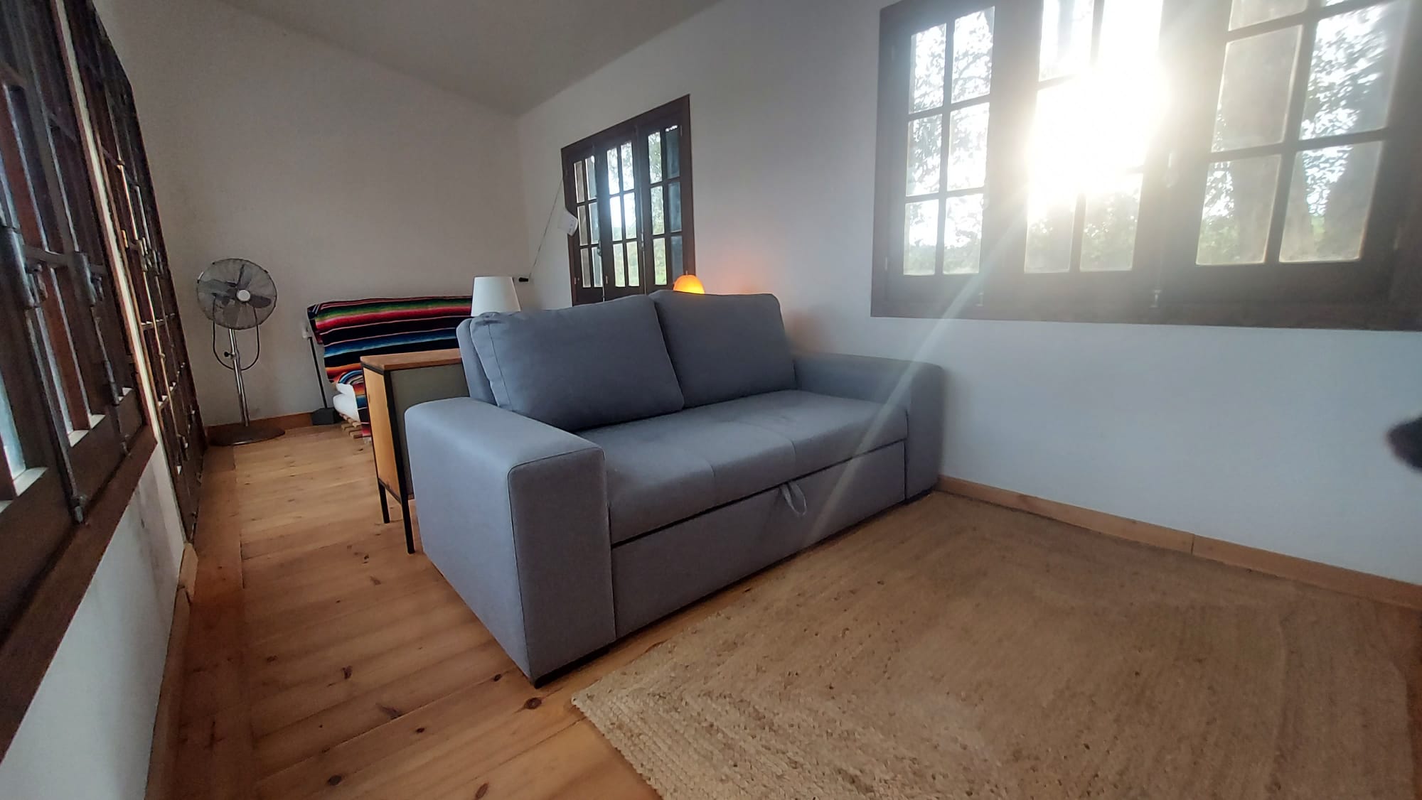 A guest room in afternoon light