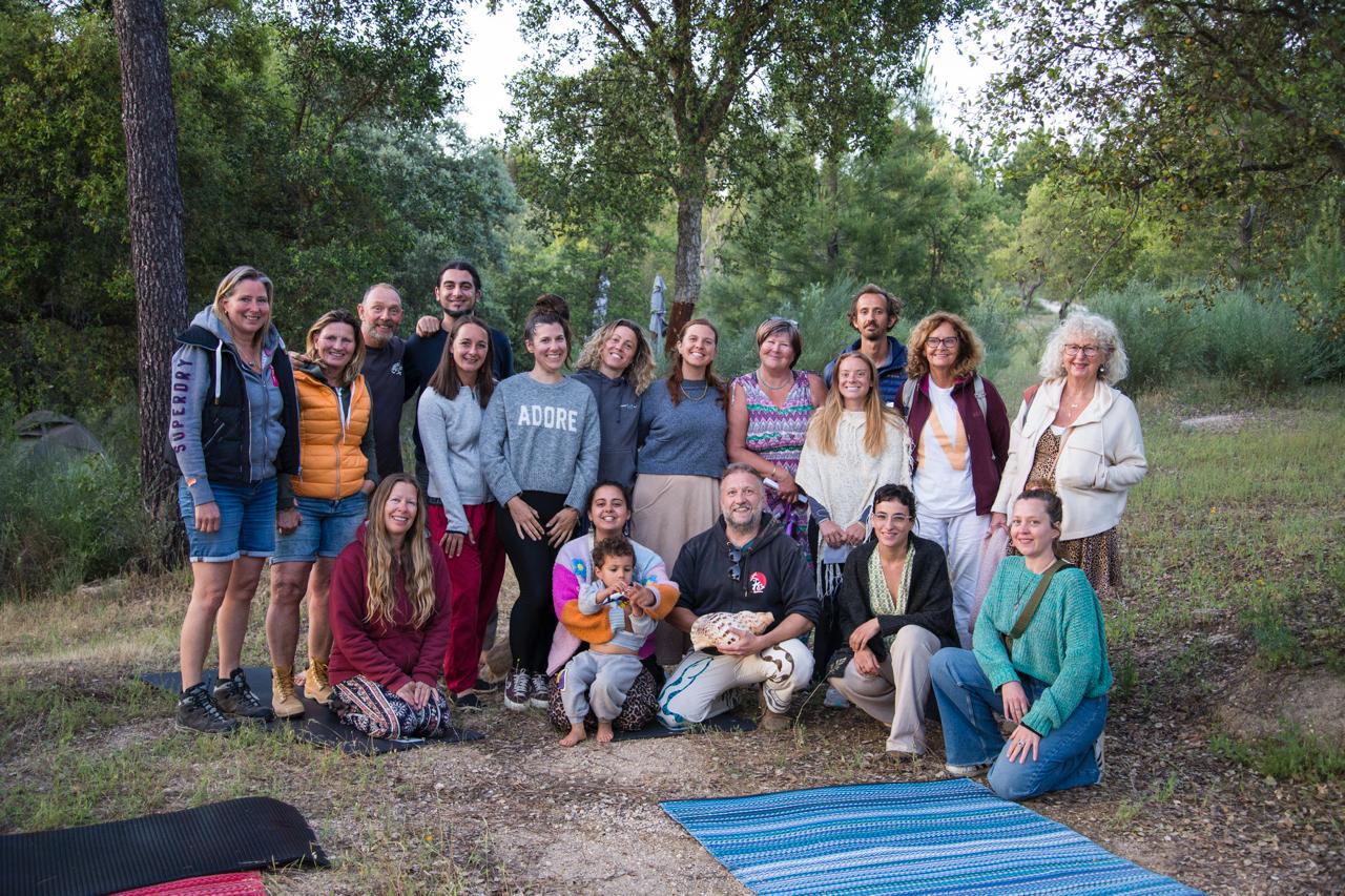 A joyful group portrait at Limiar at the close of a gathering