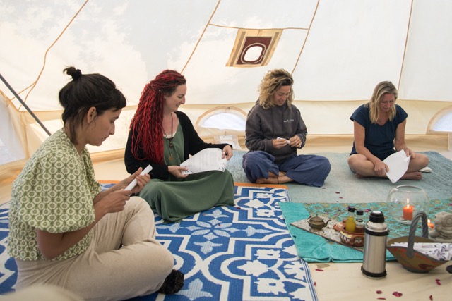 An afternoon circle inside the bell tent