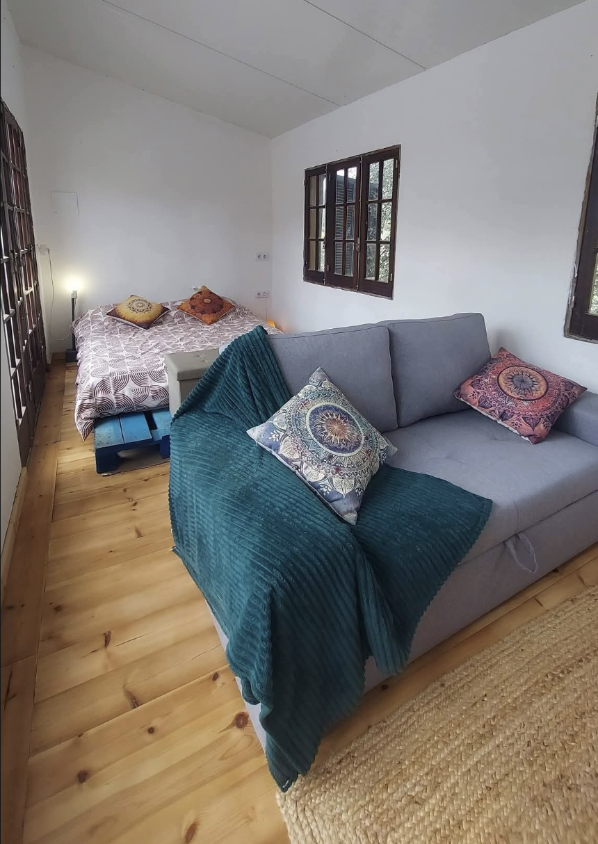 A guest room with quiet lounge corner