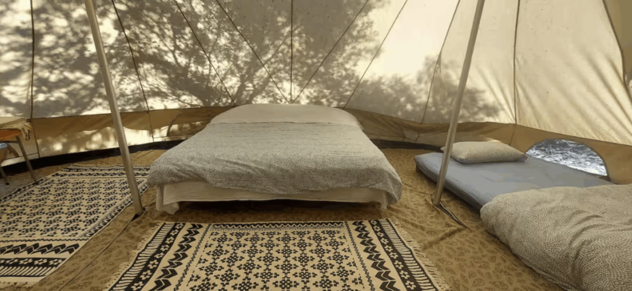 Inside — dappled light through the canvas