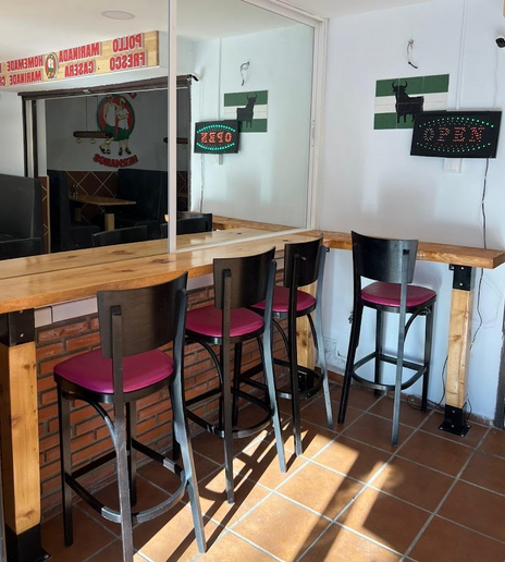 Sunny bar, Andalusian flag