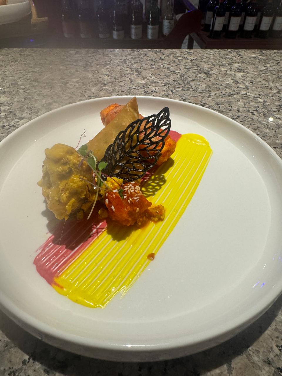 Tasting trio with butterfly tuile and saffron stripe