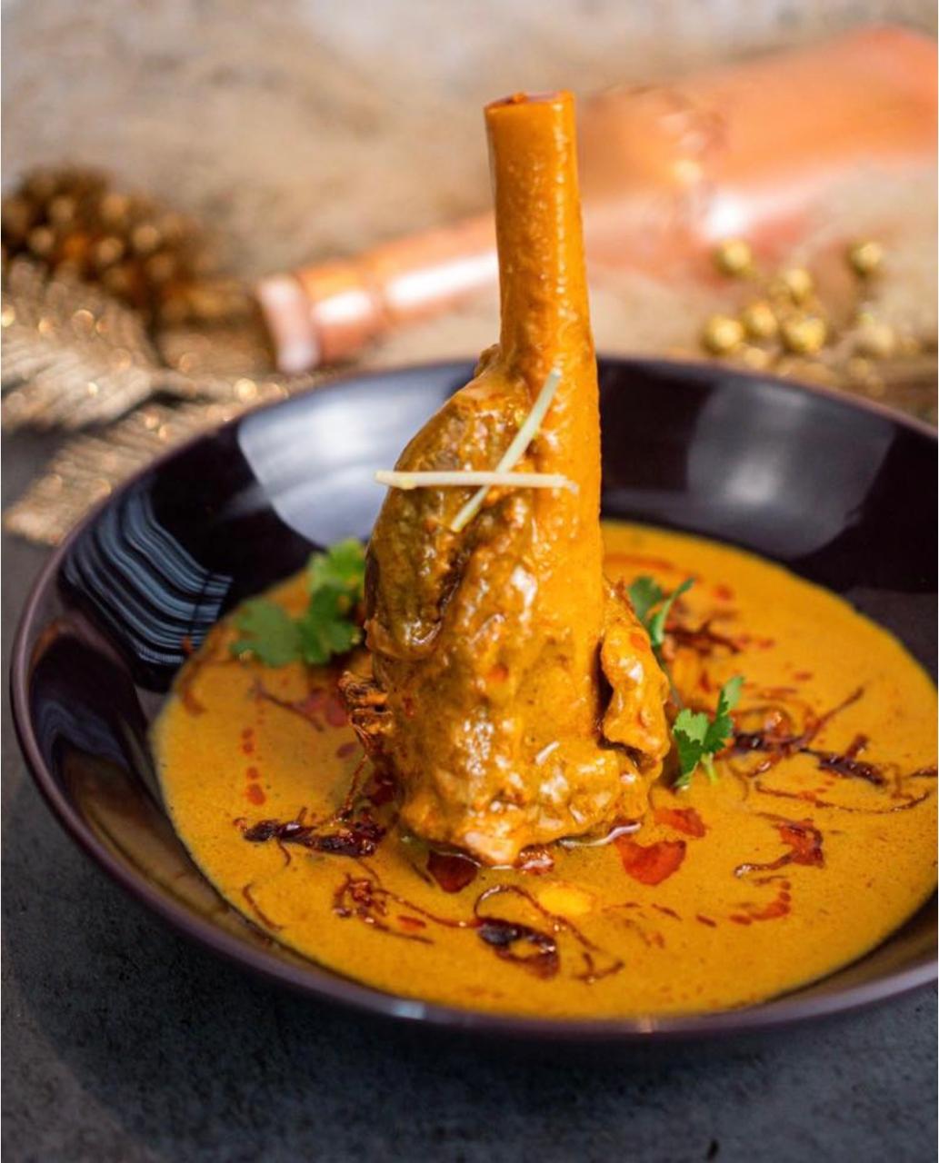 Slow-braised lamb shank in saffron curry