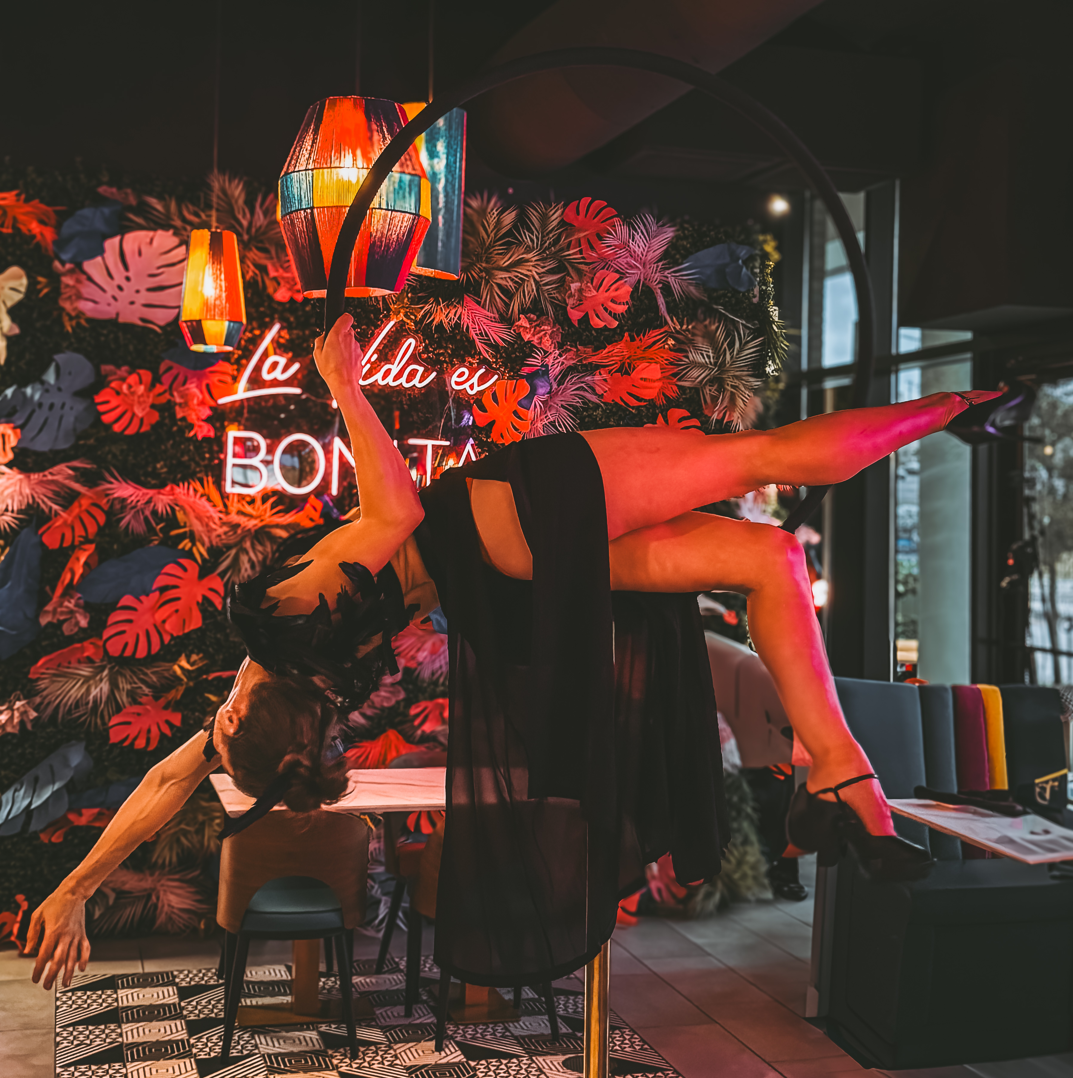 Aerial layback pose at private event
