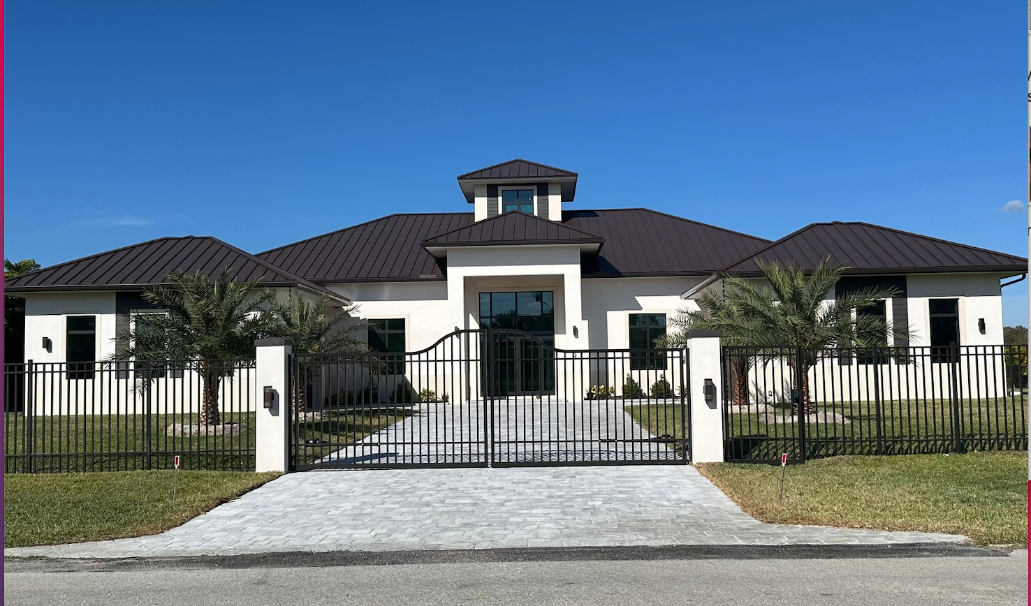 Custom new construction home in Naples FL - luxury home with metal roof and palm trees