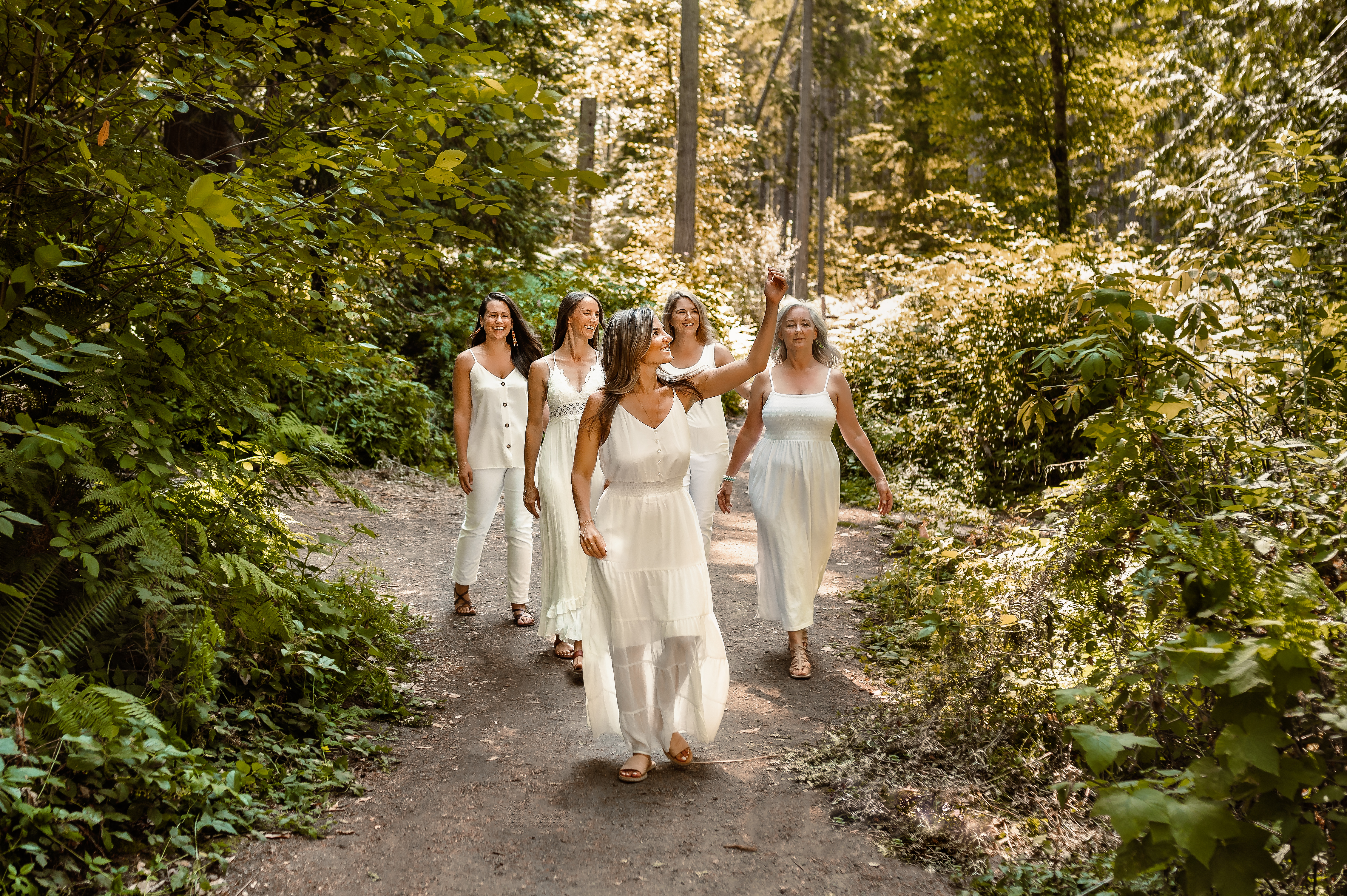 Women walking through forest