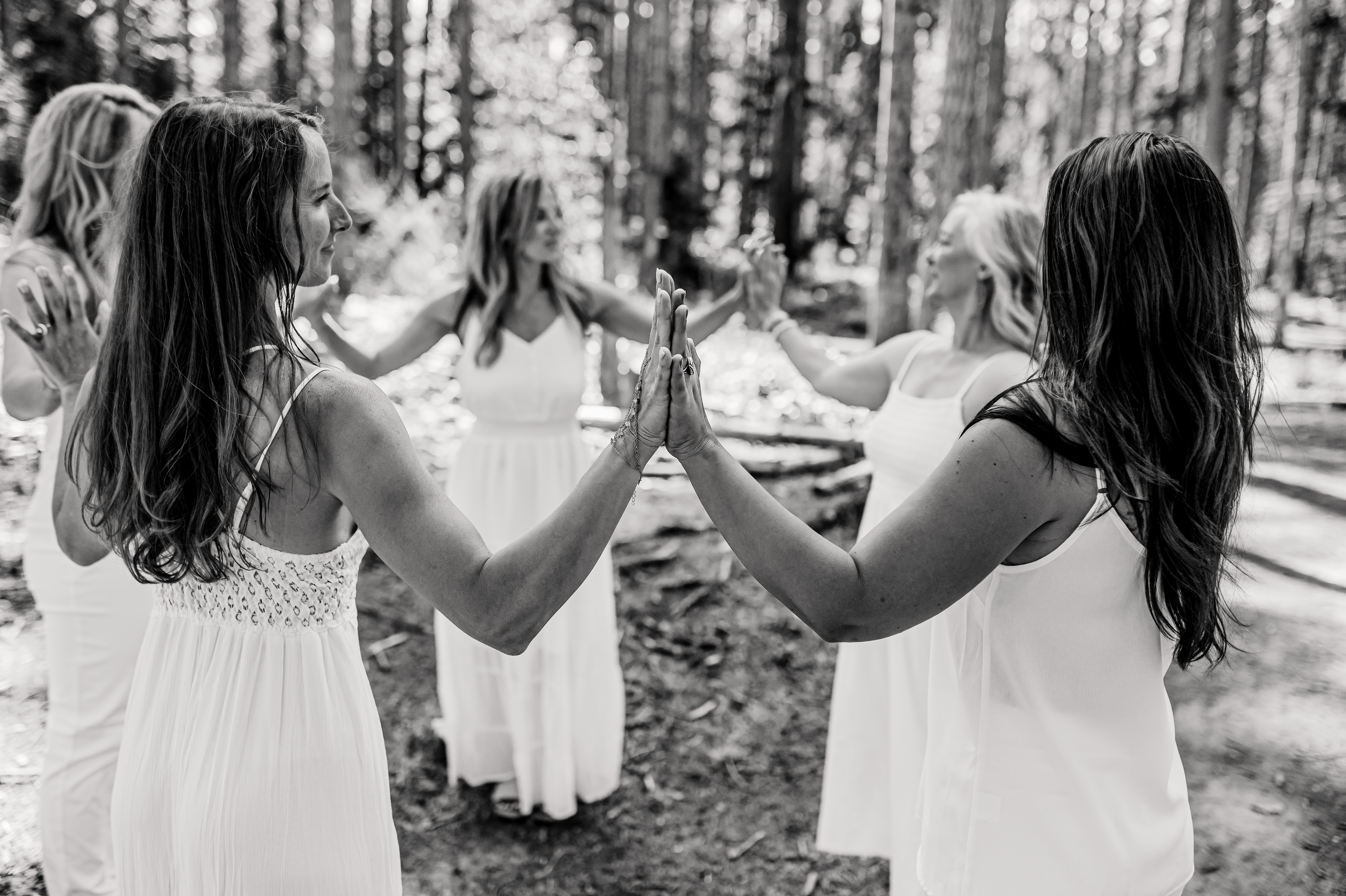 Women joining hands in a circle