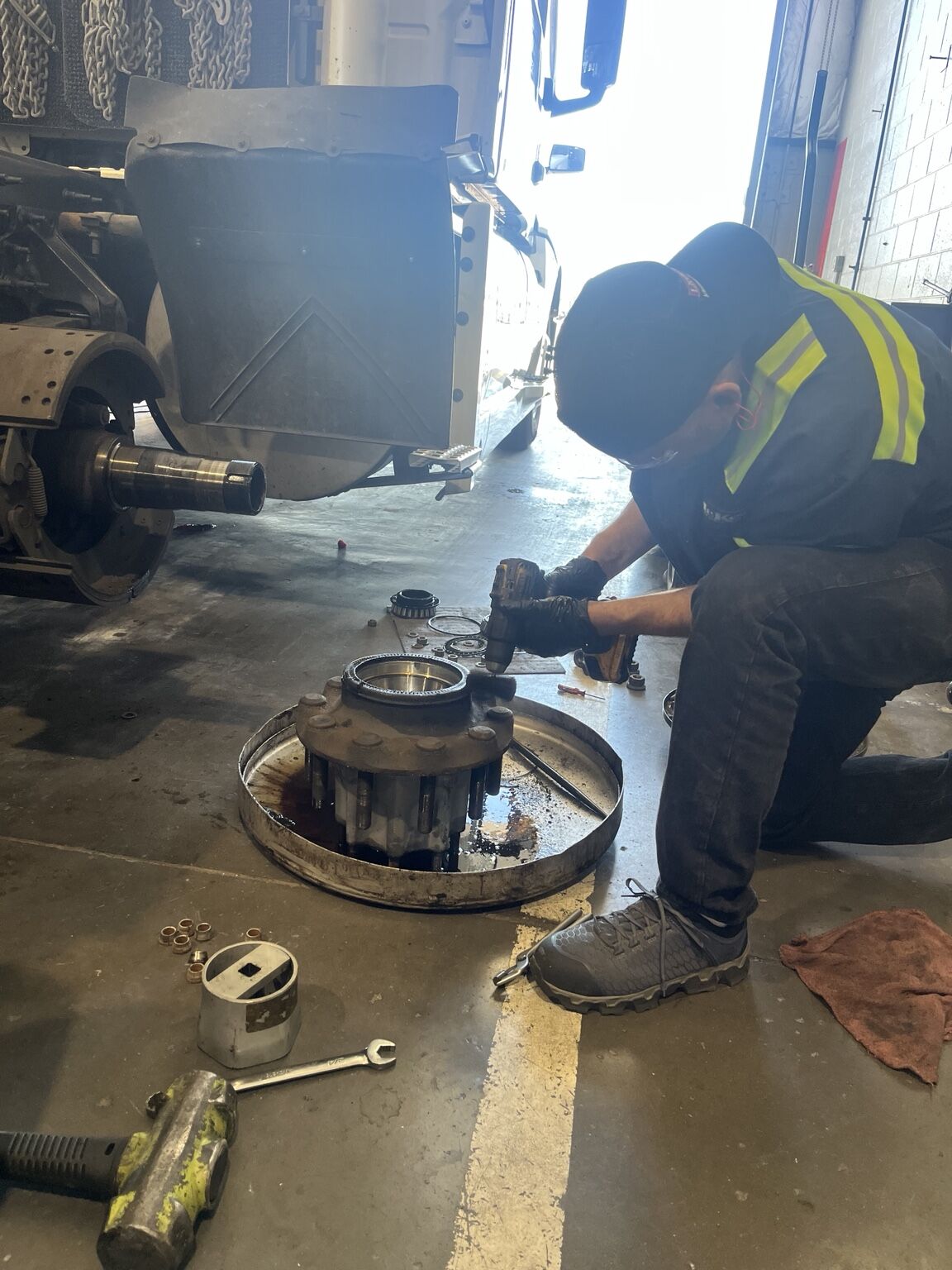 Sean working on truck hub assembly