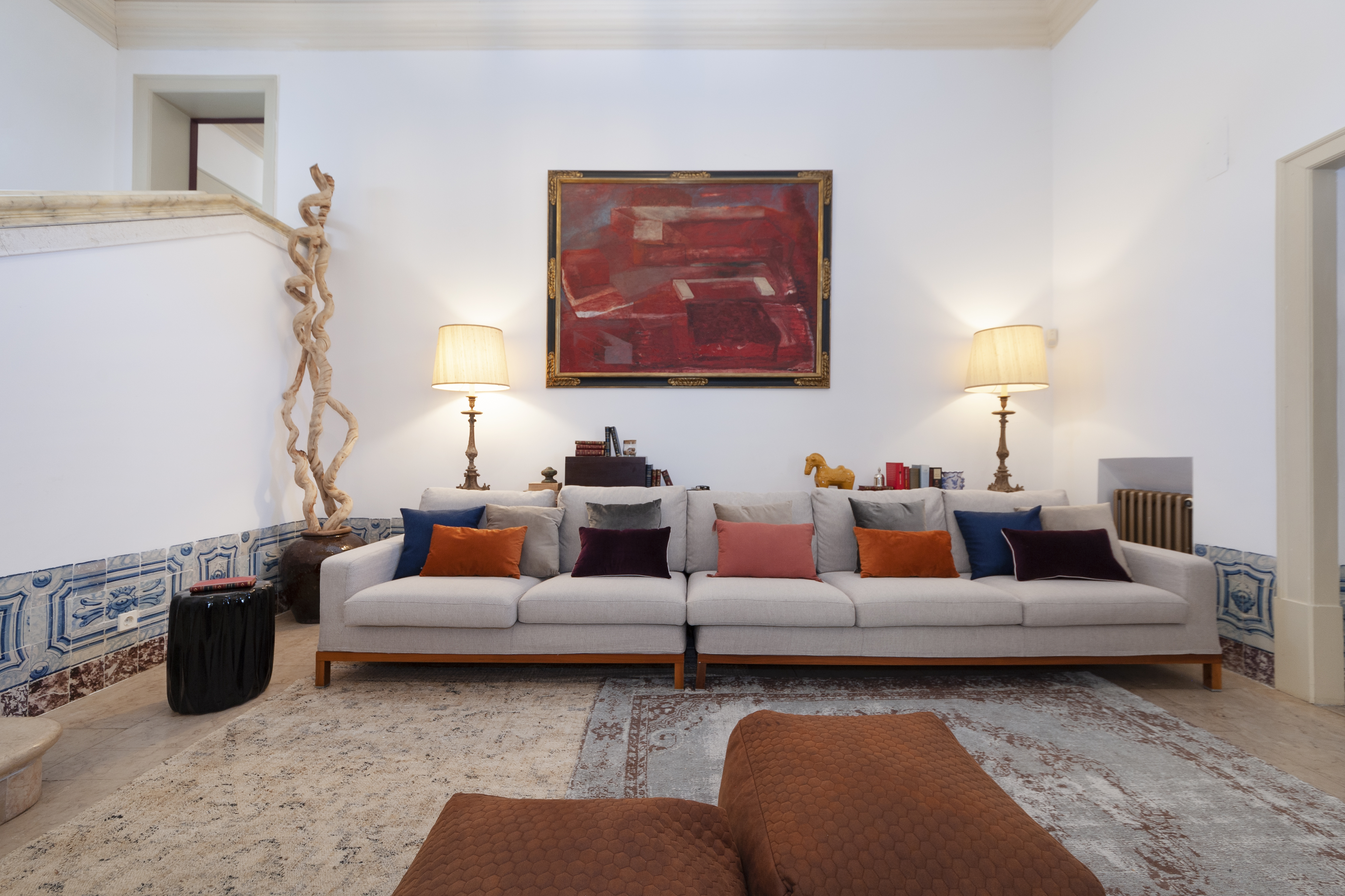 Manor house sofa details with colorful pillows