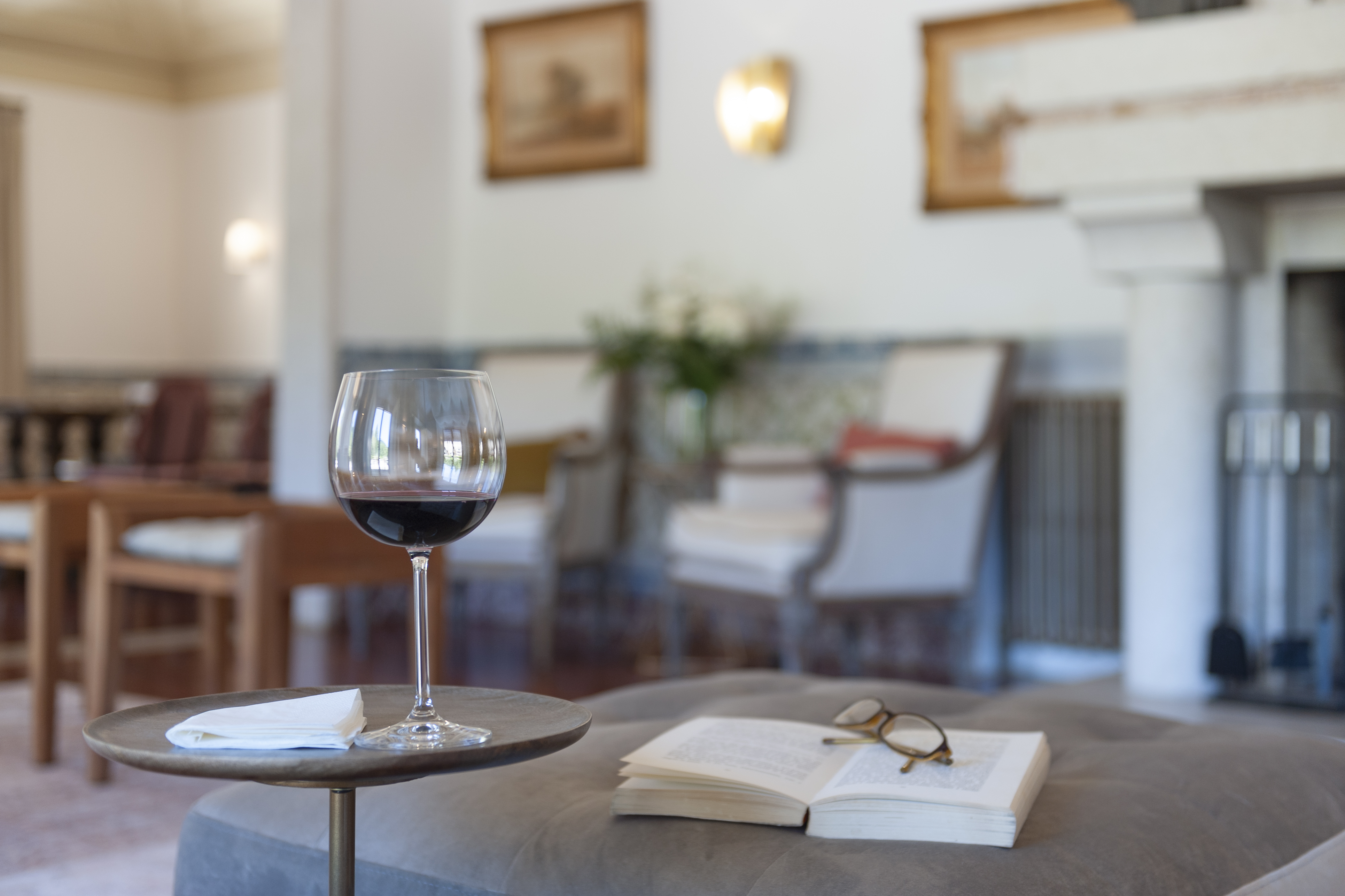Manor house wine glass and book