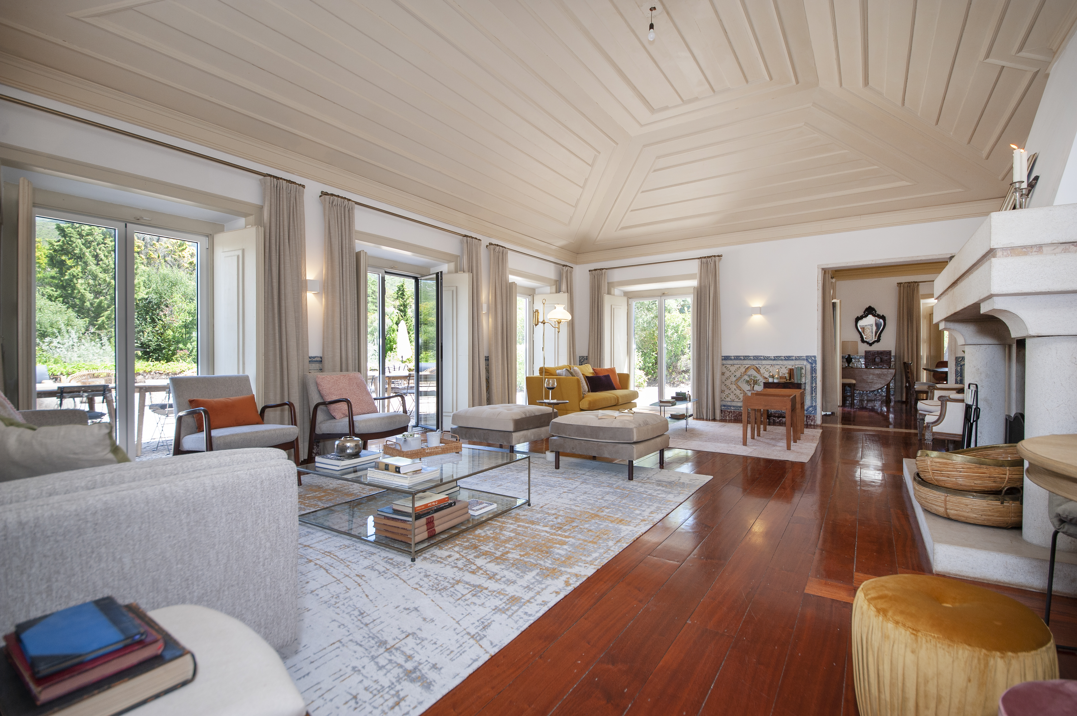 Manor house living room with yellow sofa