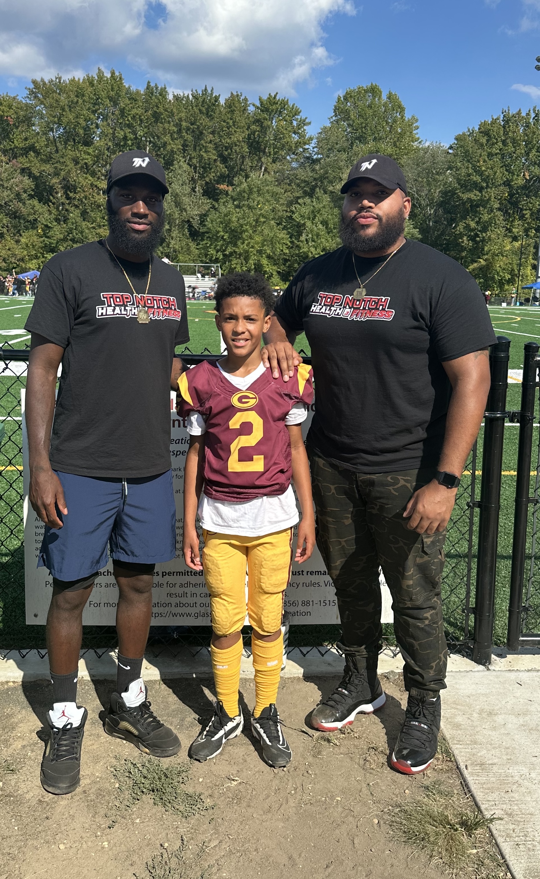 Top Notch coaches with athlete