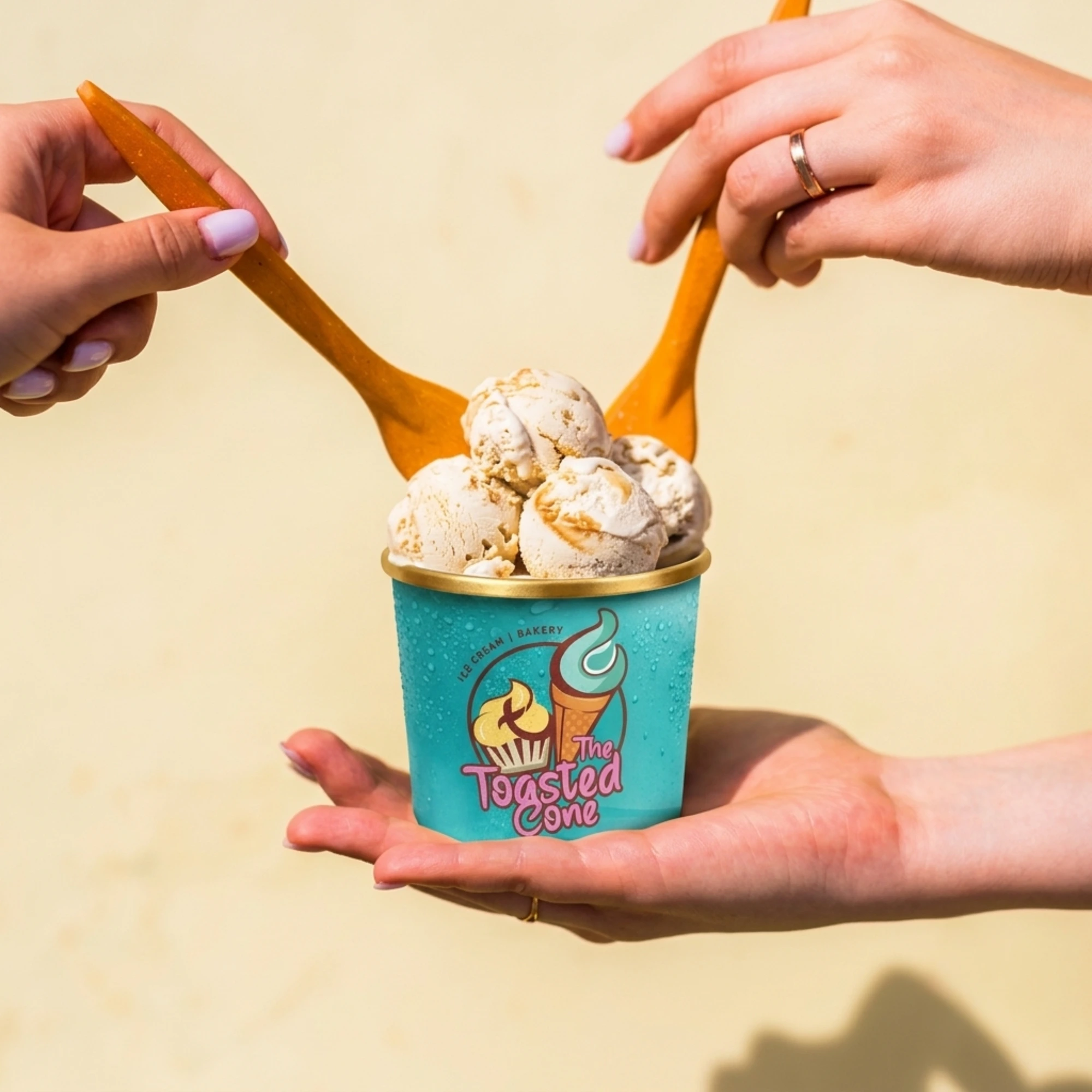 Guests sharing a Toasted Cone cup