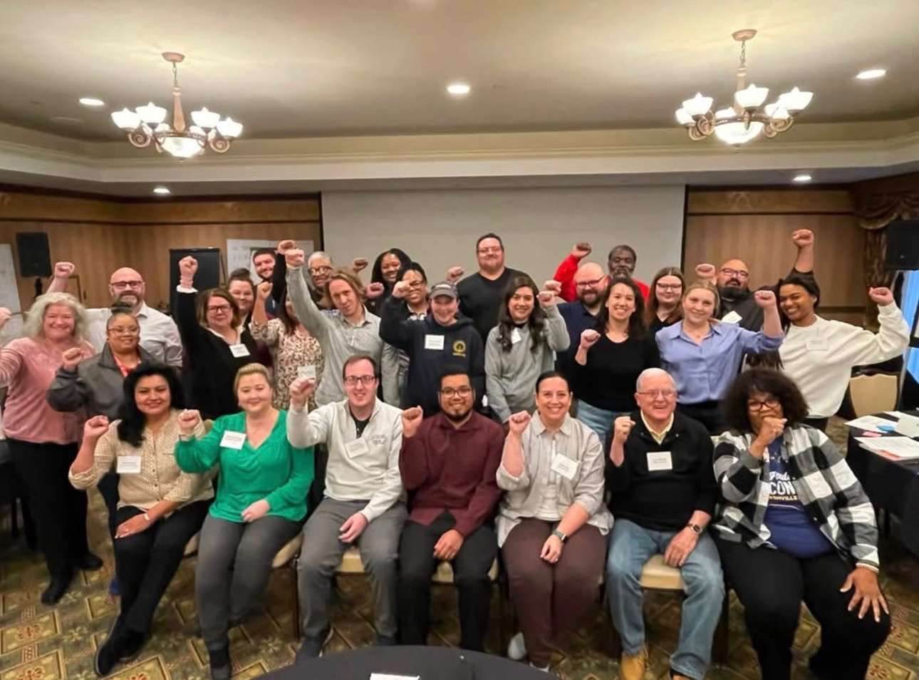 Vonda McDaniel — Solidarity forever — fists up with the next generation of leaders.