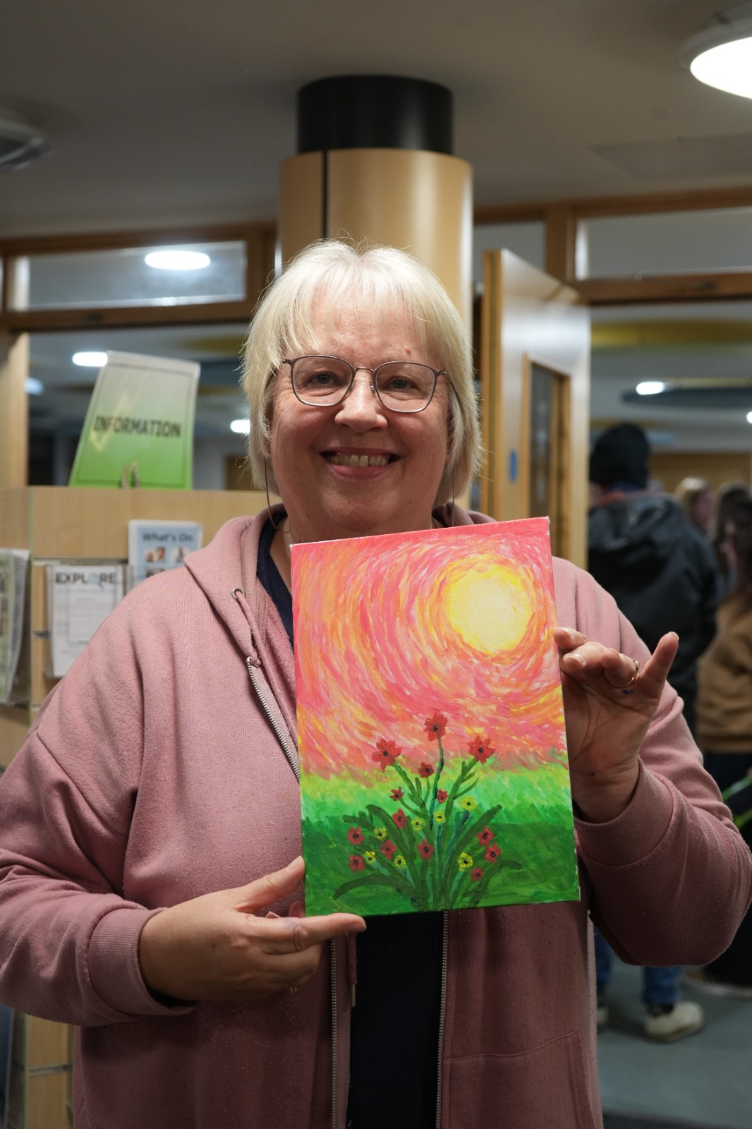 Participant with swirling sunset painting