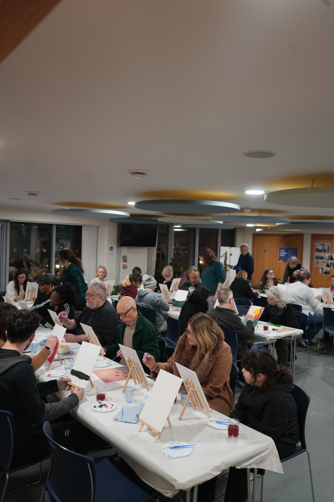 Participants painting together