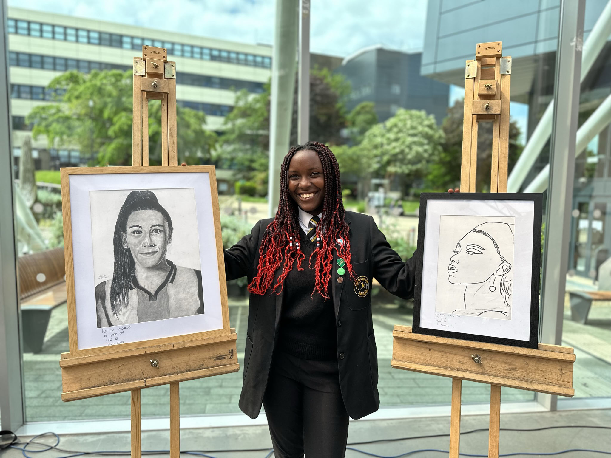 Student with charcoal and line art