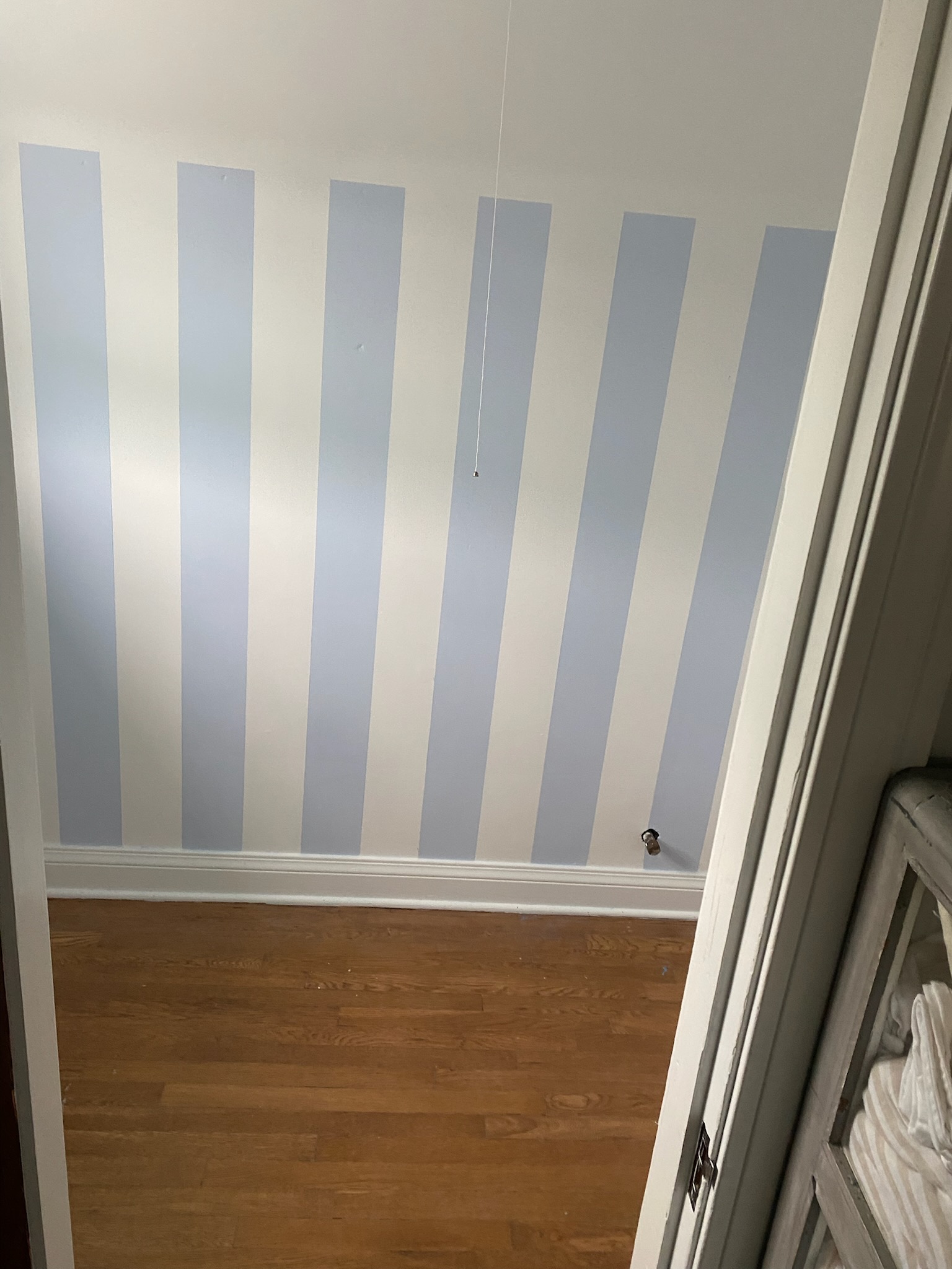 Room after painting - blue and white stripes angle