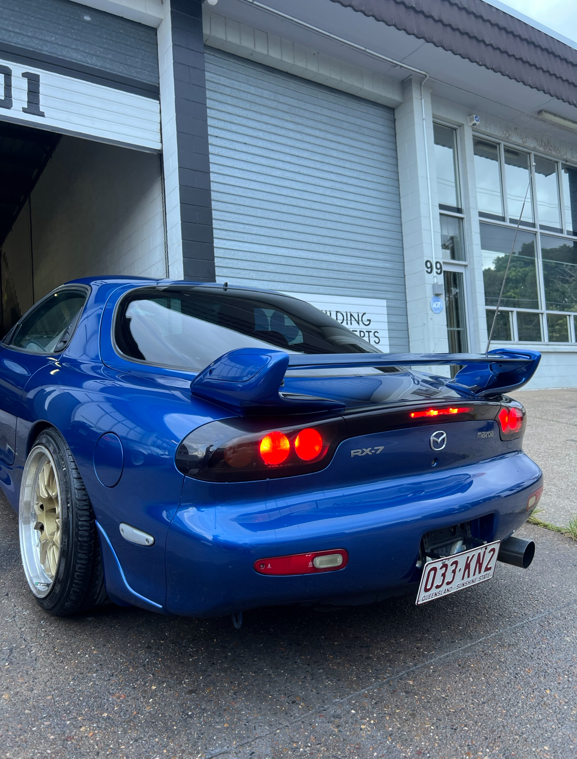 Blue Mazda RX-7 FD rear view