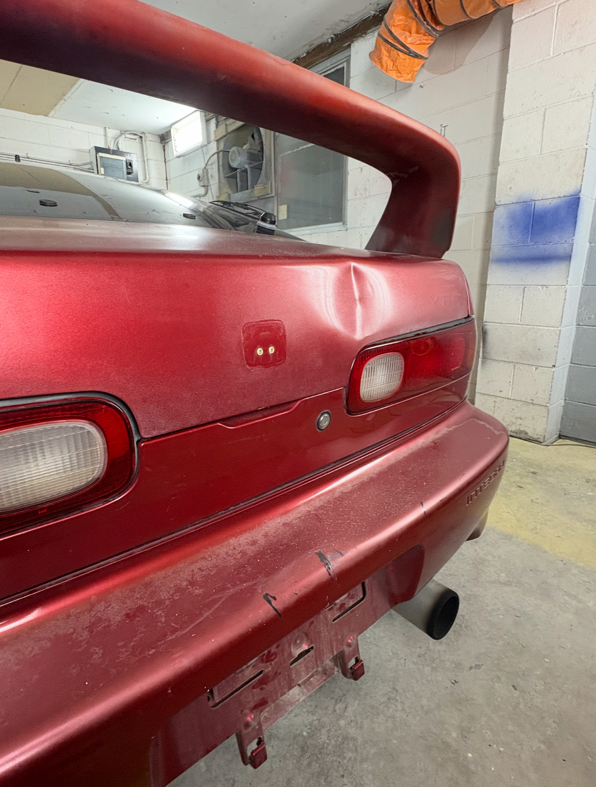 Honda Integra DC2 before respray - faded paint in workshop