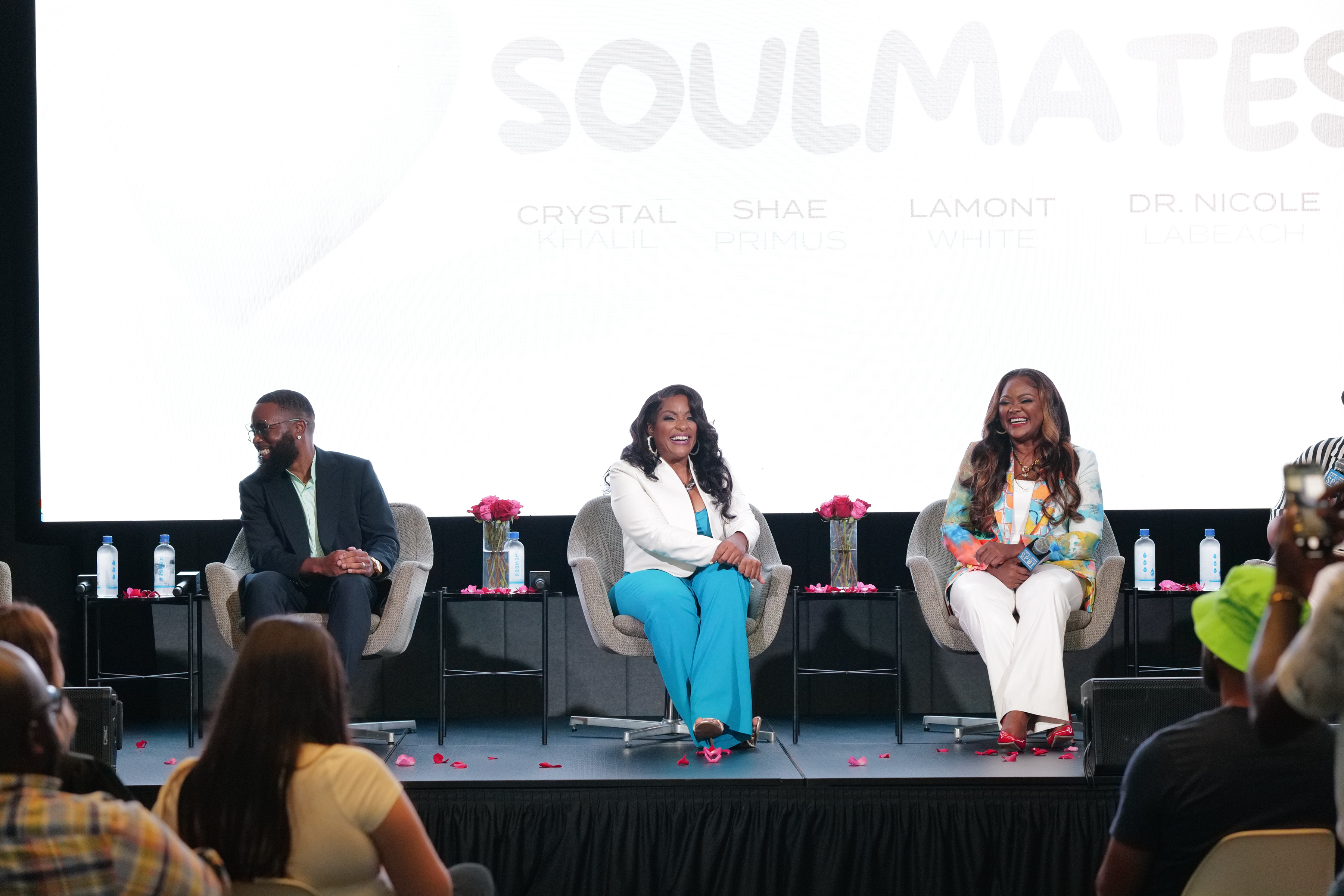 Crystal and Dr. Nicole speaking on stage