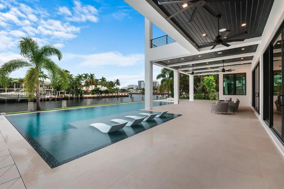 Pool and patio waterfront - luxury pool construction Naples FL