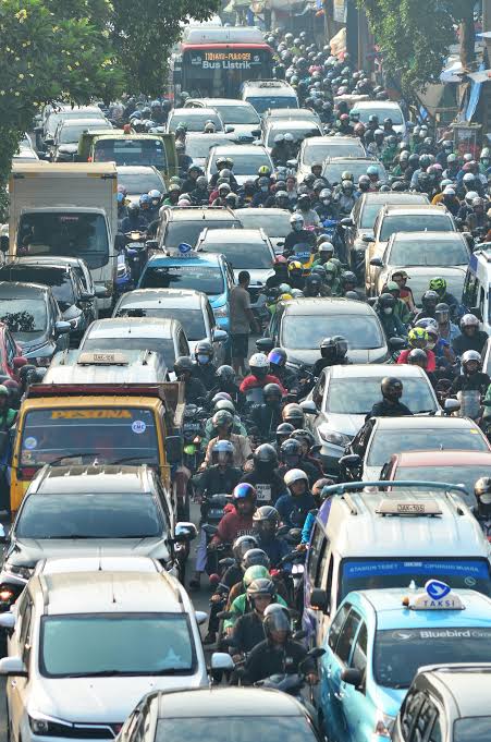 Dense scooter and motorcycle traffic