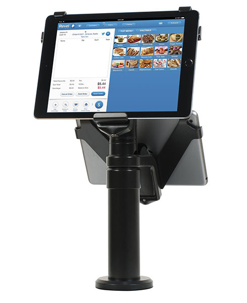 POS system tablet on a countertop stand displaying a restaurant ordering interface