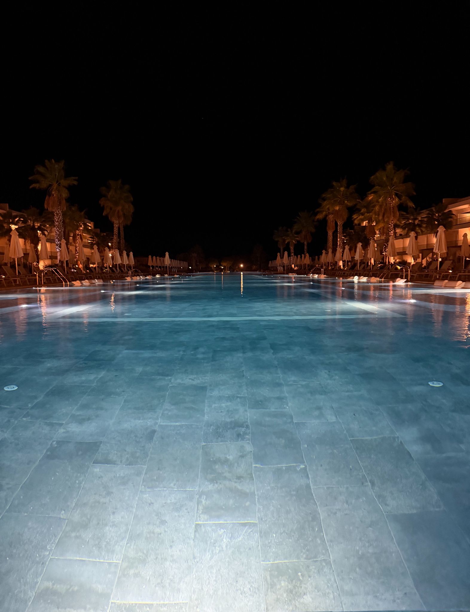 Resort Pool by Night - Travel content by Elevate UGC