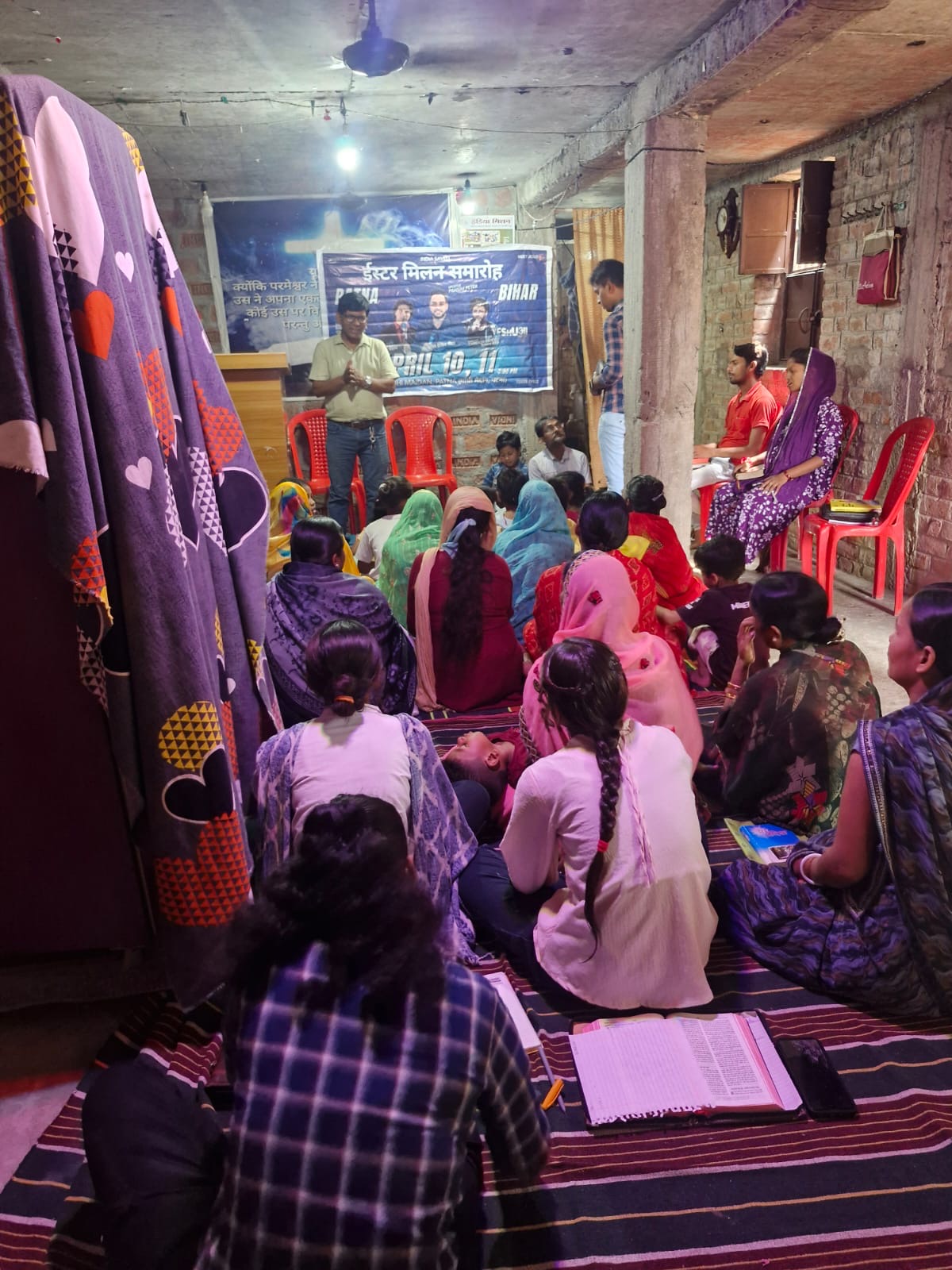 Church congregation in Bihar village with Bihar Revival banner