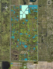 Close-up aerial view of streets and undeveloped lots in The Compound, Palm Bay — illustrating platted parcels along Kentucky Drive and surrounding SW Palm Bay roads