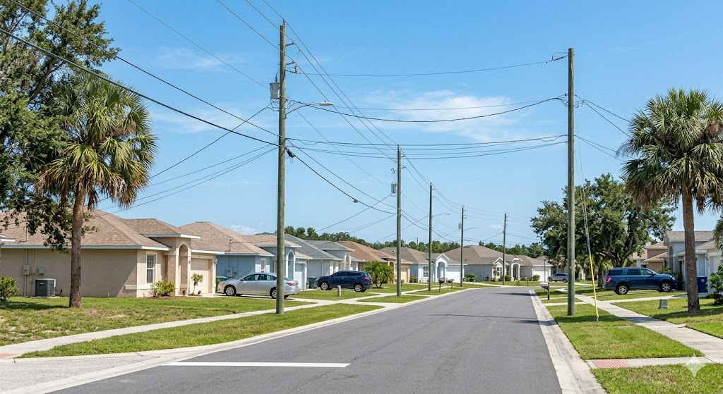 Palm Bay residential street with homes and utility lines — utility availability varies by location throughout the city