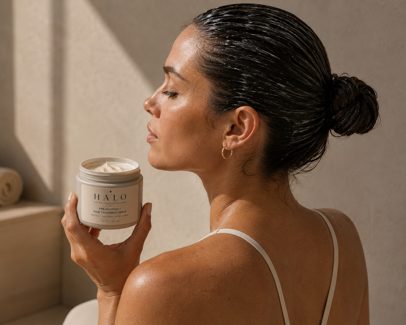 HALO Pre-Workout Hair Treatment Mask — slicked-back, treated hair ready for movement