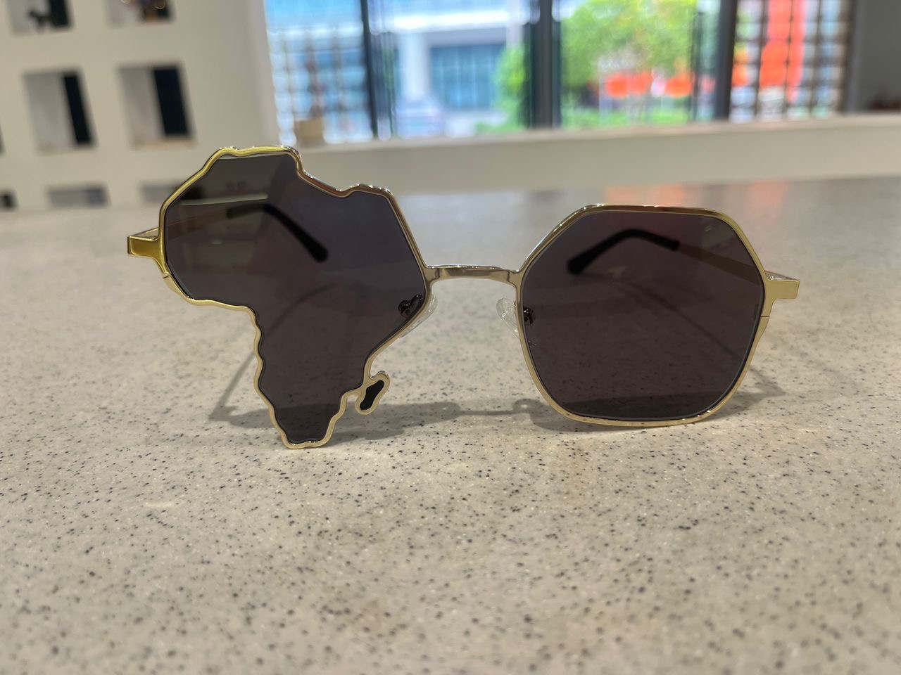 The Africa Frame Gold Edition — front view, real prototype