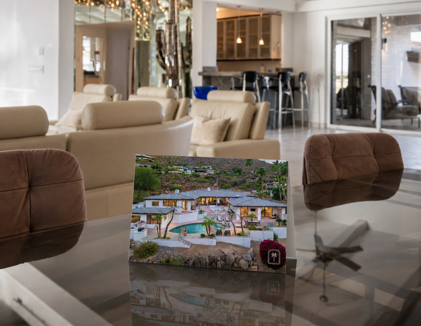 Mirrored Palms — thank-you card with property photo, in-situ on glass table