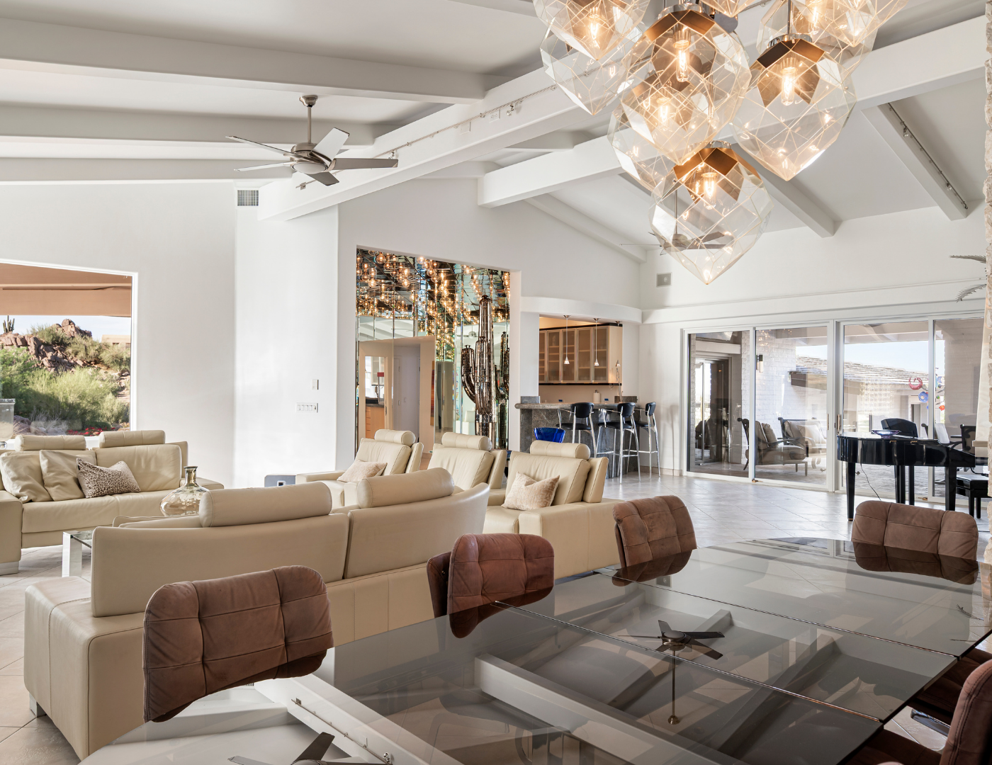 Vaulted living room with feature chandelier