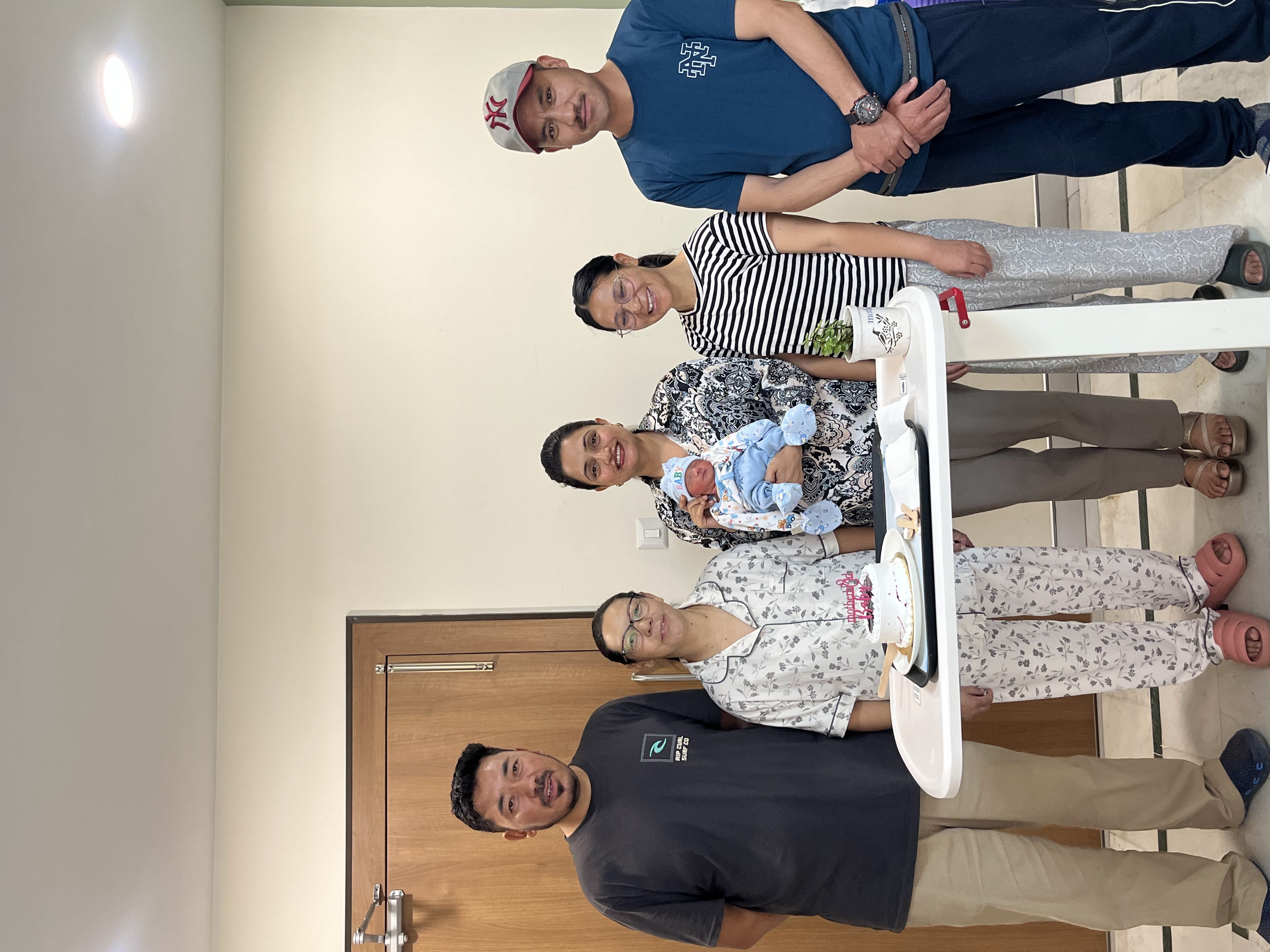 Happy Family with Newborn Baby