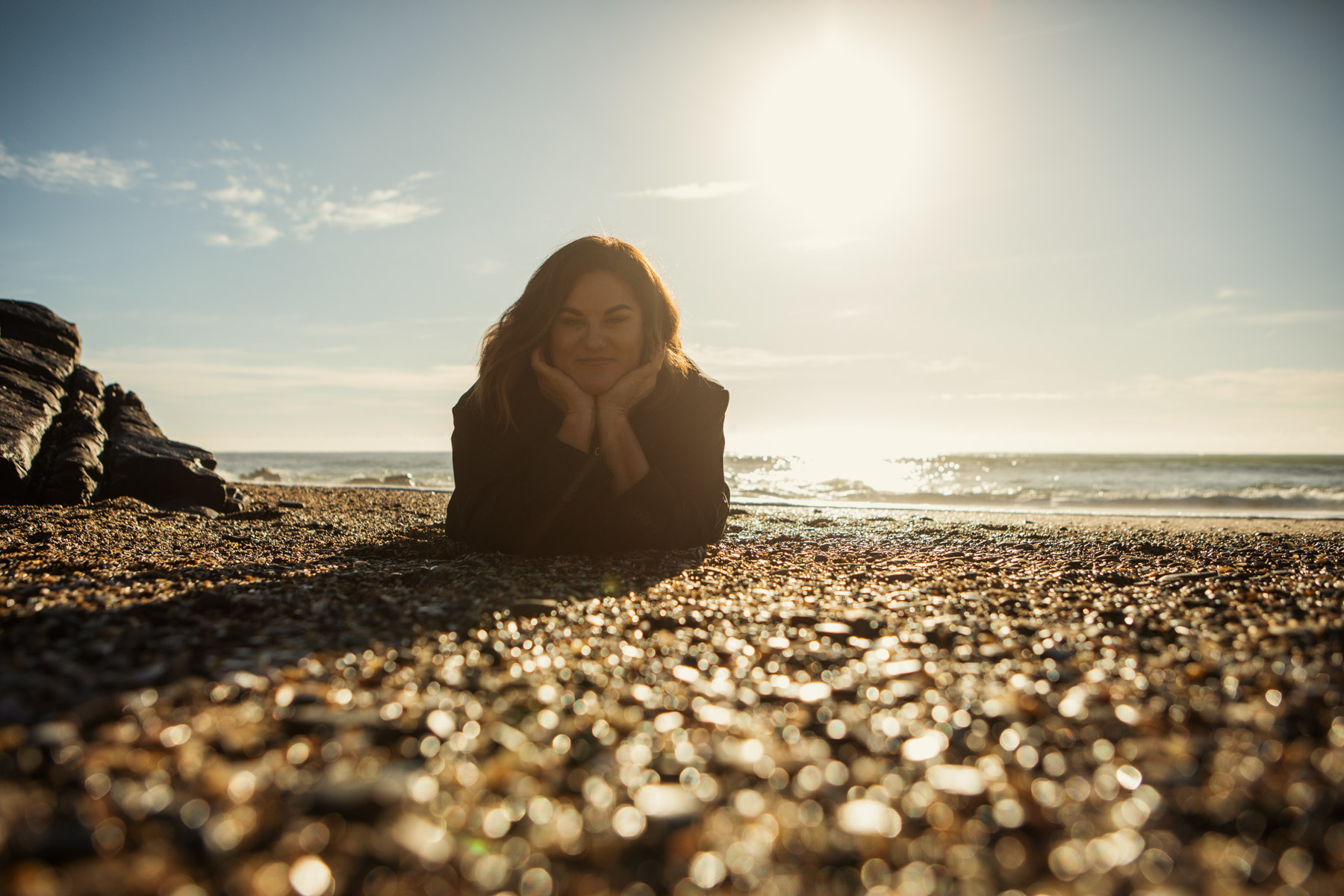 Vanessa Barrington on the beach at sunset, The Book Doula